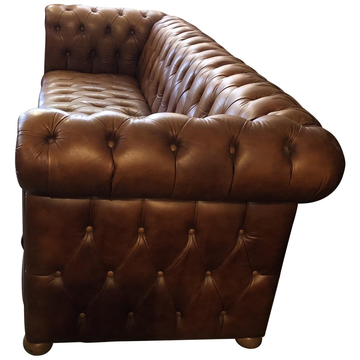 Ralph Lauren’s home furnishings and accessories reflect an enduring American style and the same level of phenomenal craftsmanship synonymous with his clothing. Plush and luxurious, this tufted Chesterfield style sofa comes clad in smooth