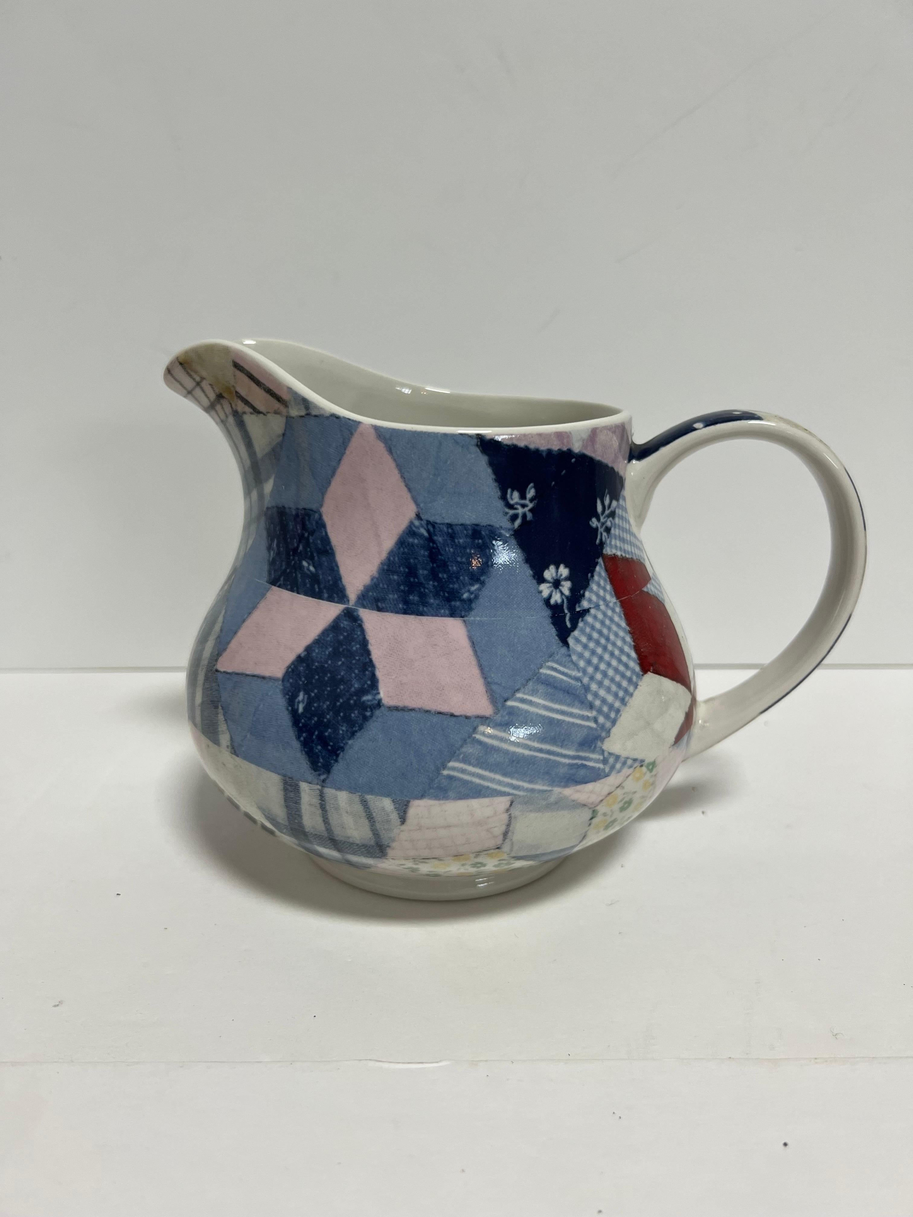 A medium sized 32 ounce pitcher by Wedgwood for Ralph Lauren Home in the Patchwork pattern.

Features a design inspired by antique Americana quilts.

Currently out of production. Originally produced from 1989 to 1993. 

Made in