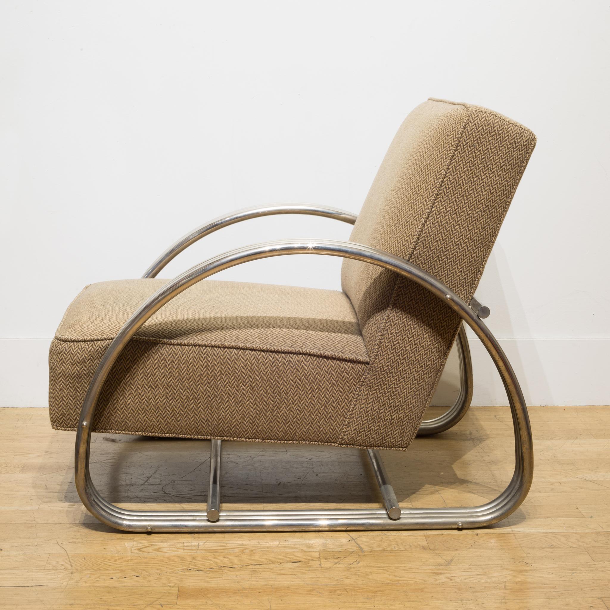 About

A polished chrome triple band frame lounge chair with upholstered fabric. Designed by Ralph Lauren and modeled after the KEM Weber Art Deco Classic 