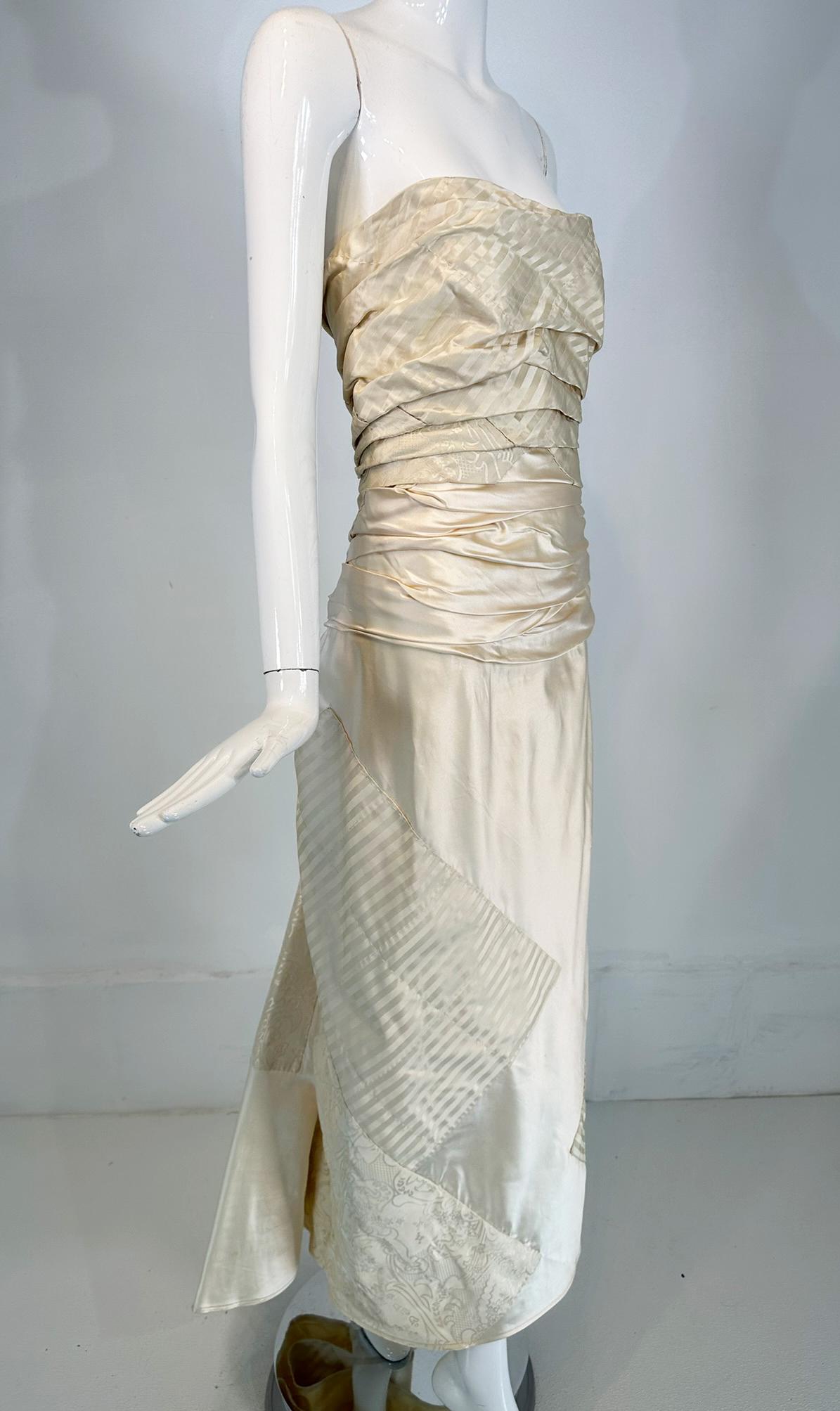 Ralph Lauren Black Label Collection, ivory silk satin ruched strapless bodice wedding/evening gown with fish tail back marked size 10. This beautiful & unusual gown has a renaissance feel, strapless and ruched through the bodice there is an interior