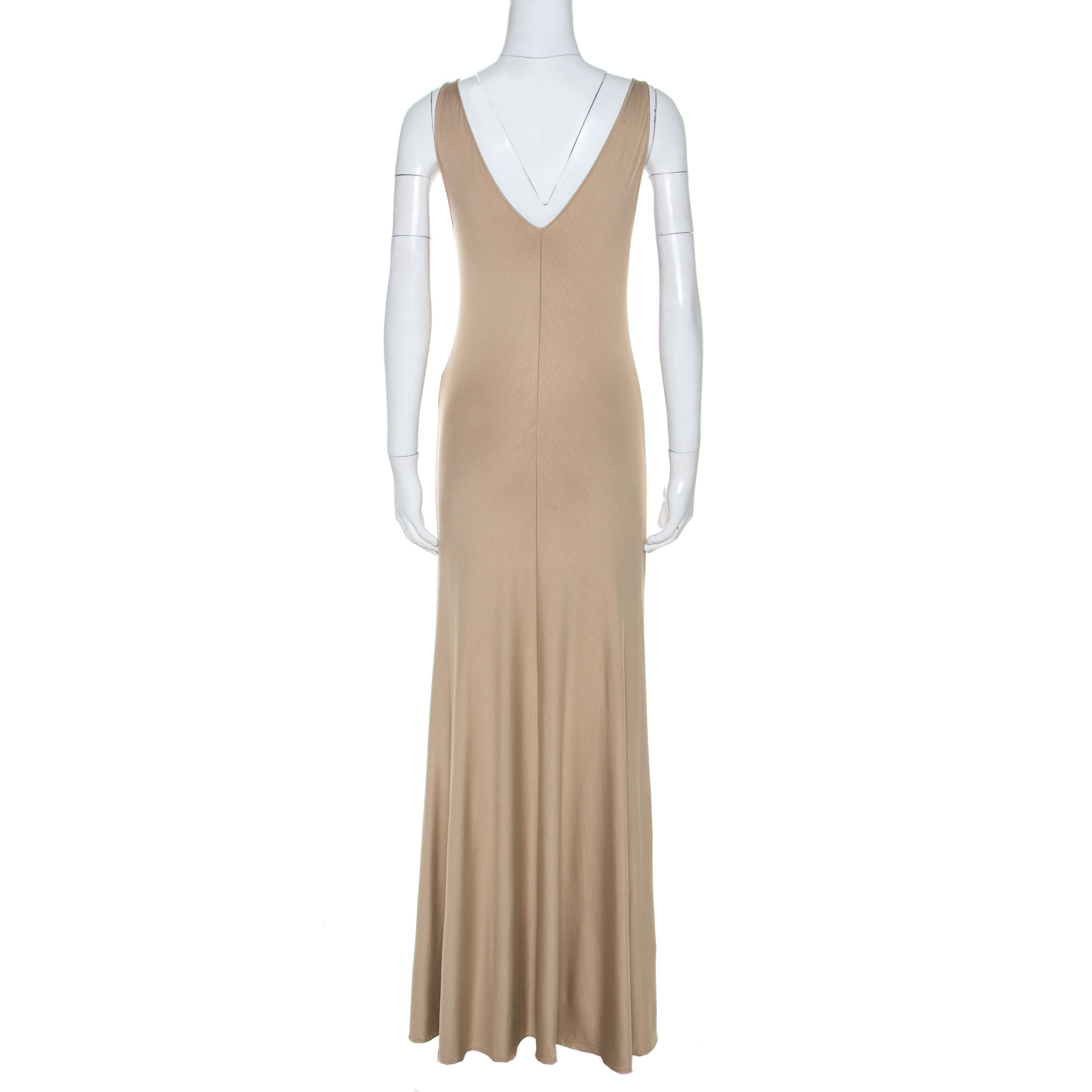 Turn heads when you wear this Ralph Lauren dress that lends a sophisticated edge to your personality. This beige ensemble is the perfect outfit for brunches or a regular day out. It has a sleeveless style with a V neckline and a fabulous fit.

