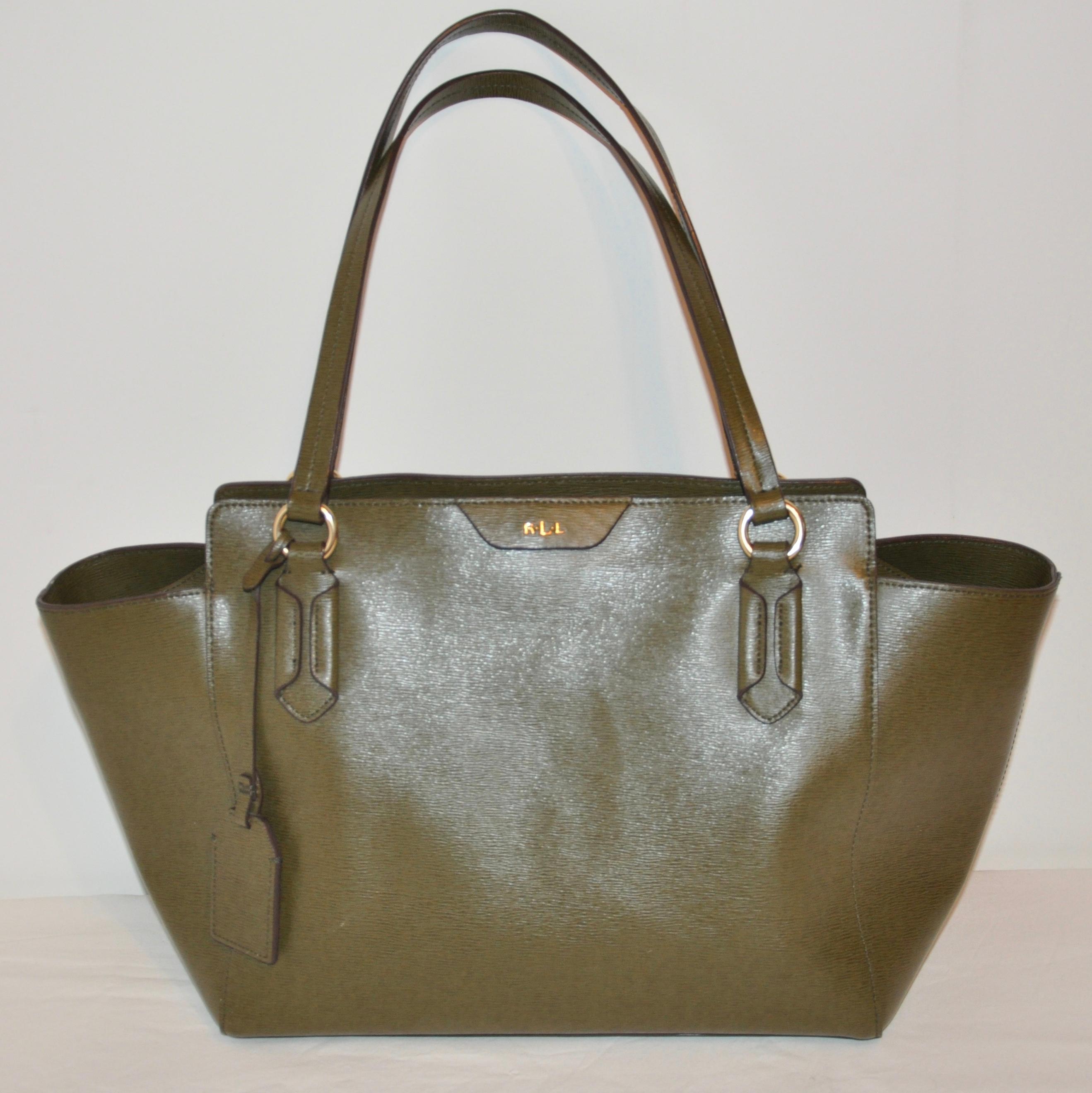        Ralph Lauren large textured calfskin olive-green double-handle tote accented with gilded gold hardware as well as gilded gold hardware footing along the bottom of the bag, measures 12 inches by 5 3/4 inches at the base. Along the top, the bag