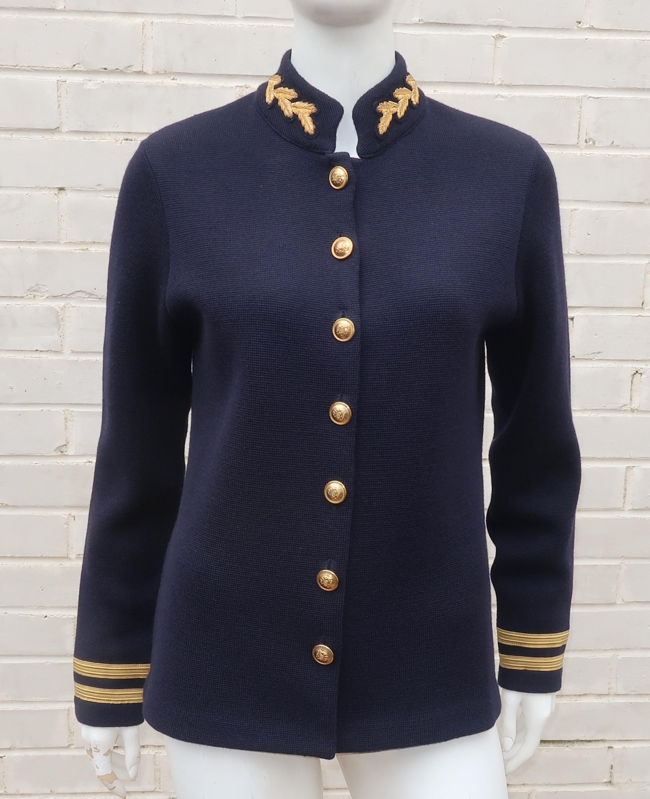 Ralph Lauren puts a fashionable spin on a military look with this wool knit cardigan sweater that resembles a Navy jacket.  The decorative gold laurel leaf appliques at the collar, insignia buttons and braiding at the cuffs are the perfect accents