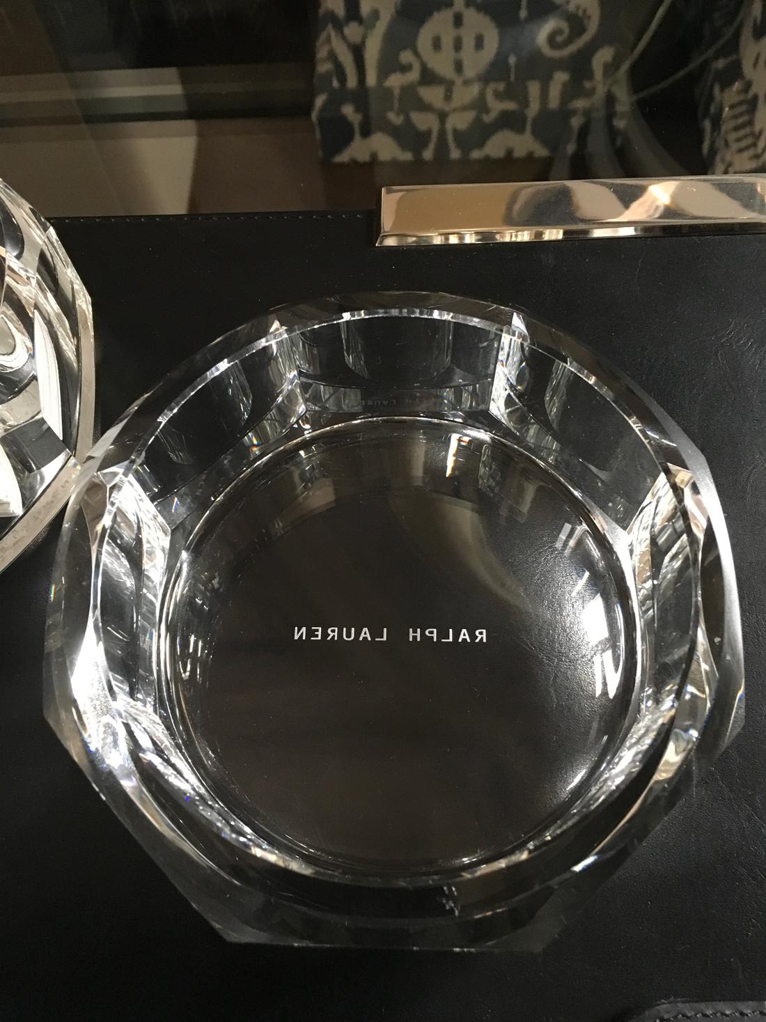 These crystal bowls are designed with a modern faceted silhouette and can also function as barware accessory as a handsome desk accessory.
We're authorized dealer in Brescia for Ralph Lauren collections.
The items are present in our showroom.
  