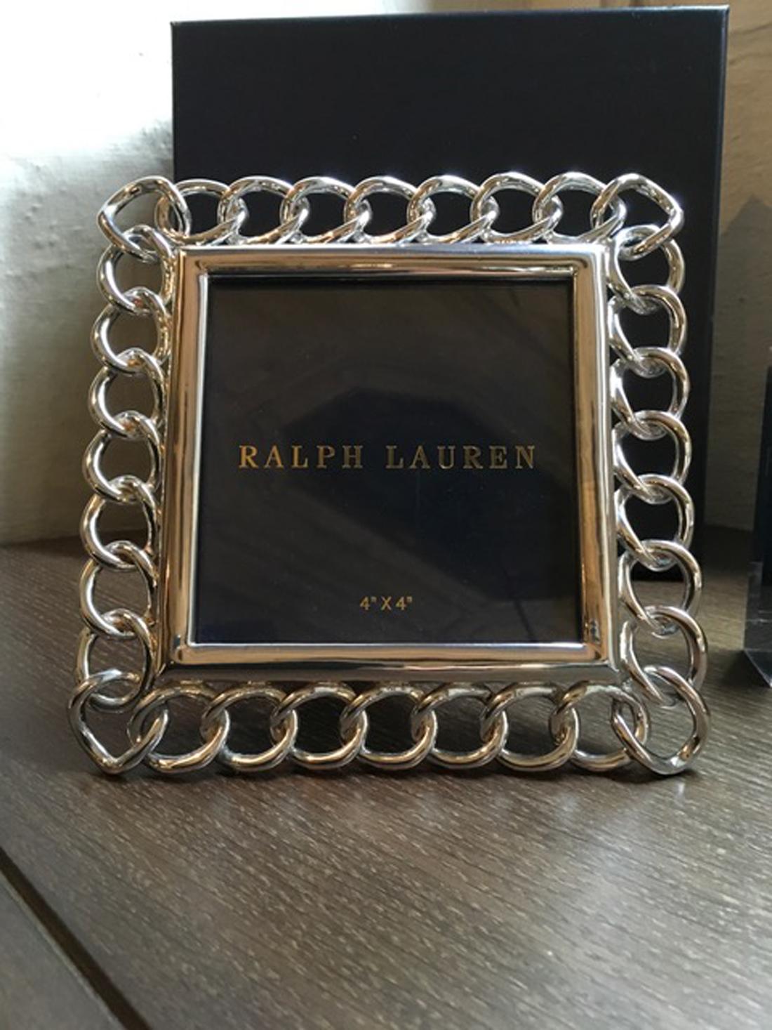 Elegant and untimeless square picture frame that is part of the contemporary Ralph Lauren Home collection. A glamour accessory to put on bedsides, desks or consolles. 
A perfect gift in every occasion.