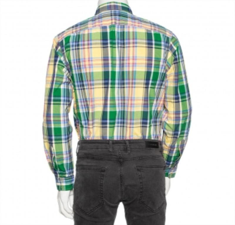 La camisa de Ralph Lauren tiene un aspecto versátil y se puede llevar con una gran variedad de pantalones informales. Confeccionado en algodón, presenta un colorido estampado de cuadros Oxford y mangas largas. Lleva cierres de botón a lo largo de la