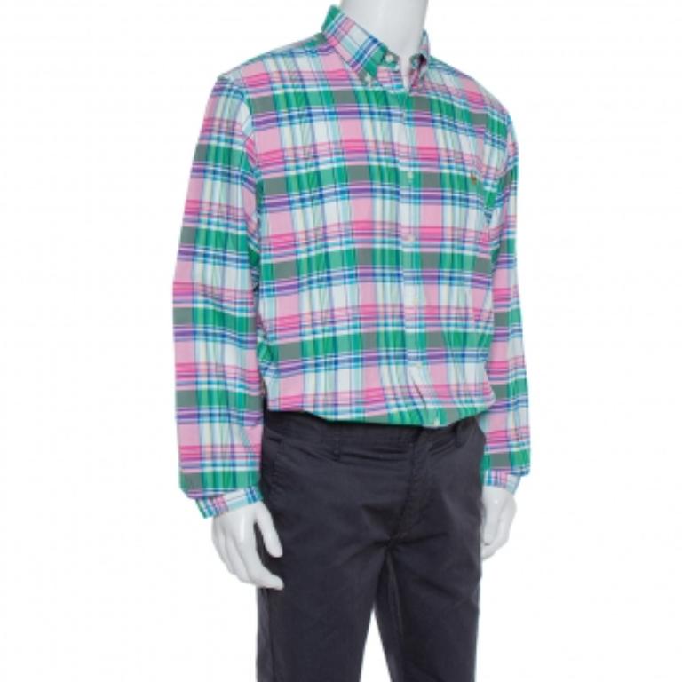 If you're wondering what to wear to work, this Ralph Lauren cotton shirt is here to save the day. The shirt, styled with a collar, a plaid print, and lined with front buttons, is comfortable and stylish. A pair of contrasting trousers and oxfords