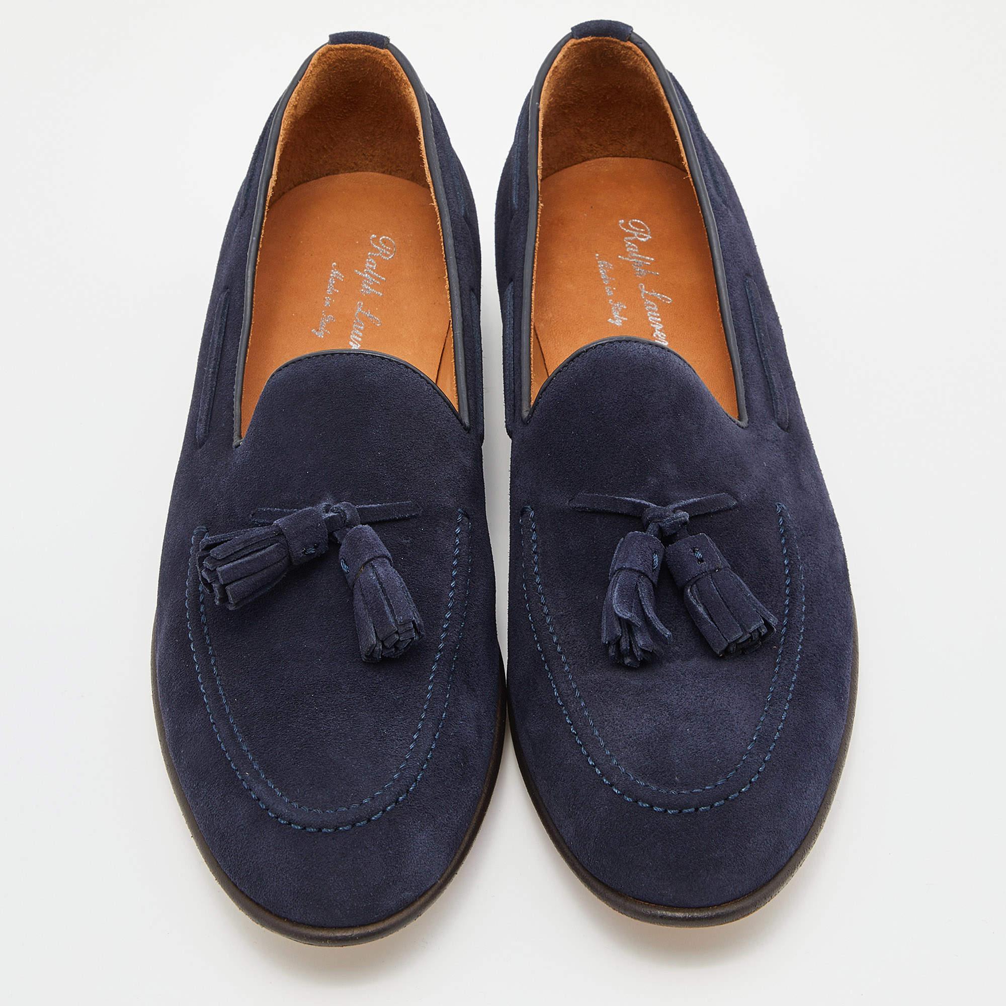 Let comfort and classic style be yours with these designer loafers from Ralph Lauren. Crafted in navy blue suede, the high-quality shoes have the perfect construction to take you through the day with utmost ease.

Includes: Original Dustbag,