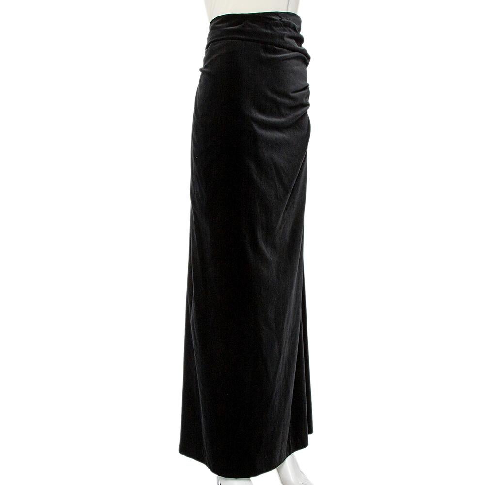 Channel elegant charm with this maxi skirt from Ralph Lauren. The elegant black skirt is made of lush velvet fabric and features a creatively draped silhouette. Pair it with an off-shoulder top and strappy sandals for a put-together look.

