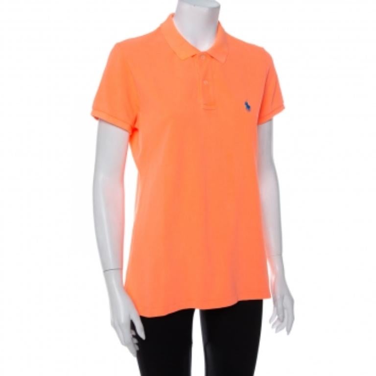 Up your style quotient with this polo t-shirt from Ralph Lauren. Crafted from cotton, this stylish creation comes in an orange hue. It is styled with a simple collar, buttoned placket, short sleeves, and a straight hem.