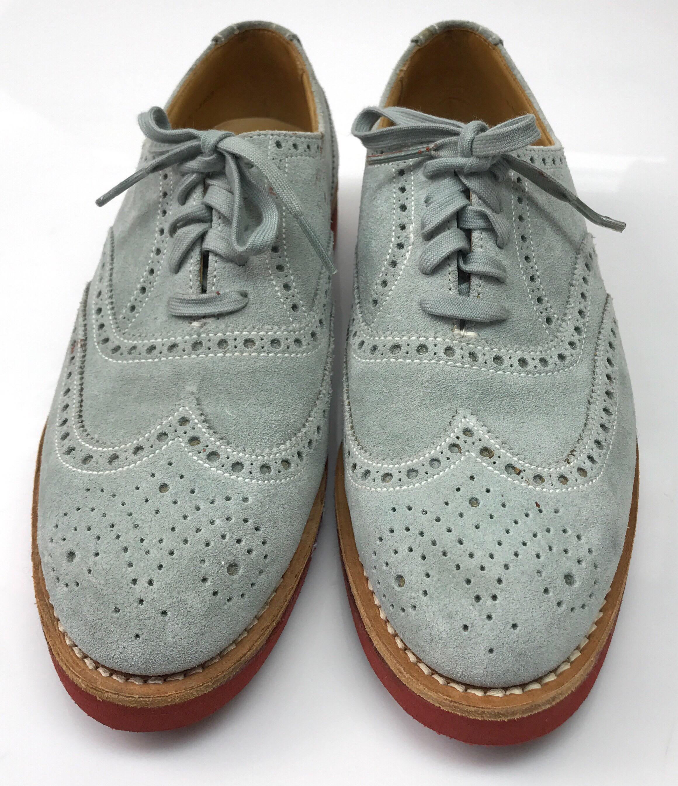 Ralph Lauren Pale Blue Suede Oxfords - 6.5. These beautiful Ralph Lauren oxfords are in good condition. There is minor red stains in a few spots, as shown in picture. These shoes are made of a pale blue suede material and have a cutout design