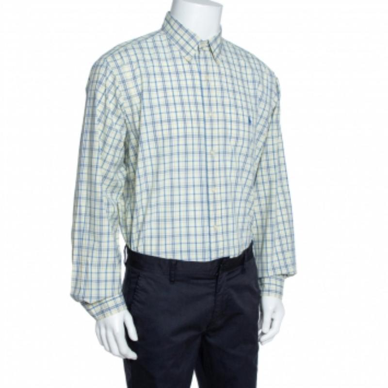 Ralph Lauren's comfortable shirt holds a versatile look and can be worn with a variety of formal bottoms. Crafted from cotton, it features a pale yellow checked pattern and long sleeves. It is equipped with button fastenings on the front.
