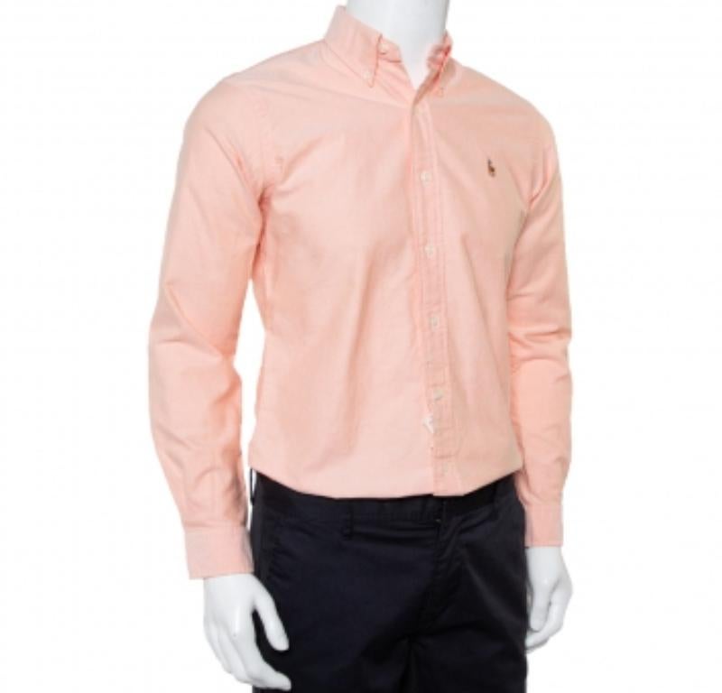 Set style goals for everyone by adorning this stunning custom-fit shirt from the house of Ralph Lauren. Look smart in this creation that comes in a pink shade. Tailored from cotton, it is styled with a collar, long cuffed sleeves, button front, and