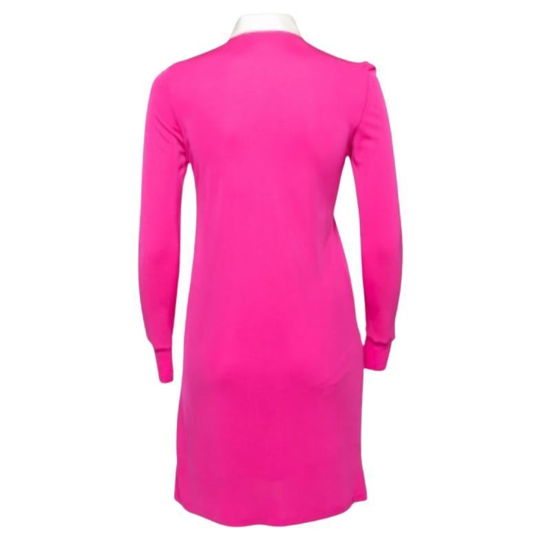 Pretty in pink, this Ralph Lauren creation is something you don't want to miss. It is fashioned in pink jersey and flaunts an embroidered logo on the front. It is finished with contrasting collars and long sleeves. Wear it with sneakers and sport a