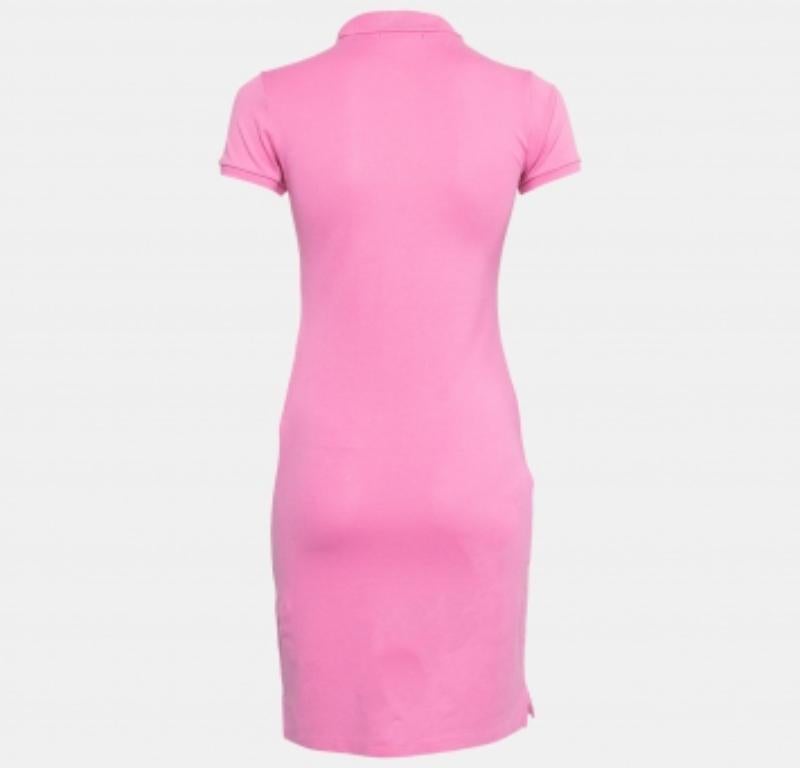 Sport a trendy casual style by wearing this pretty pink dress from Ralph Lauren. An embroidered logo accent embellishes the front of this dress. It is tailored from pink cotton pique fabric and is complemented with short sleeves, collars, and