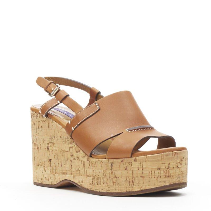 RALPH LAUREN Purple Collection tan brown leather cork wedge platform EU37.5
Reference: LNKO/A01679
Brand: Ralph Lauren
Material: Leather
Color: Brown
Pattern: Solid
Extra Details: Sling back. Silvertone hardware. Overstitch detail. Cork