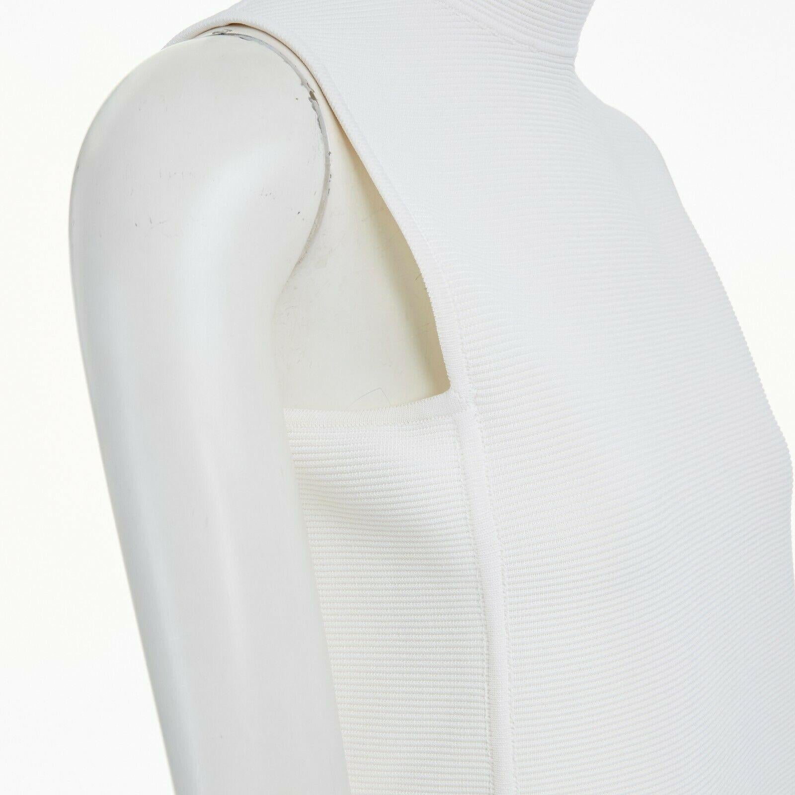 RALPH LAUREN PURPLE COLLECTION white textured knit mock collar vest top S 
Reference: LNKO/A01066 
Brand: Ralph Lauren 
Material: Viscose 
Color: White 
Pattern: Solid 
Closure: Zip 
Extra Detail: Viscose, nylon, elastane. White. Textured knit. Mock