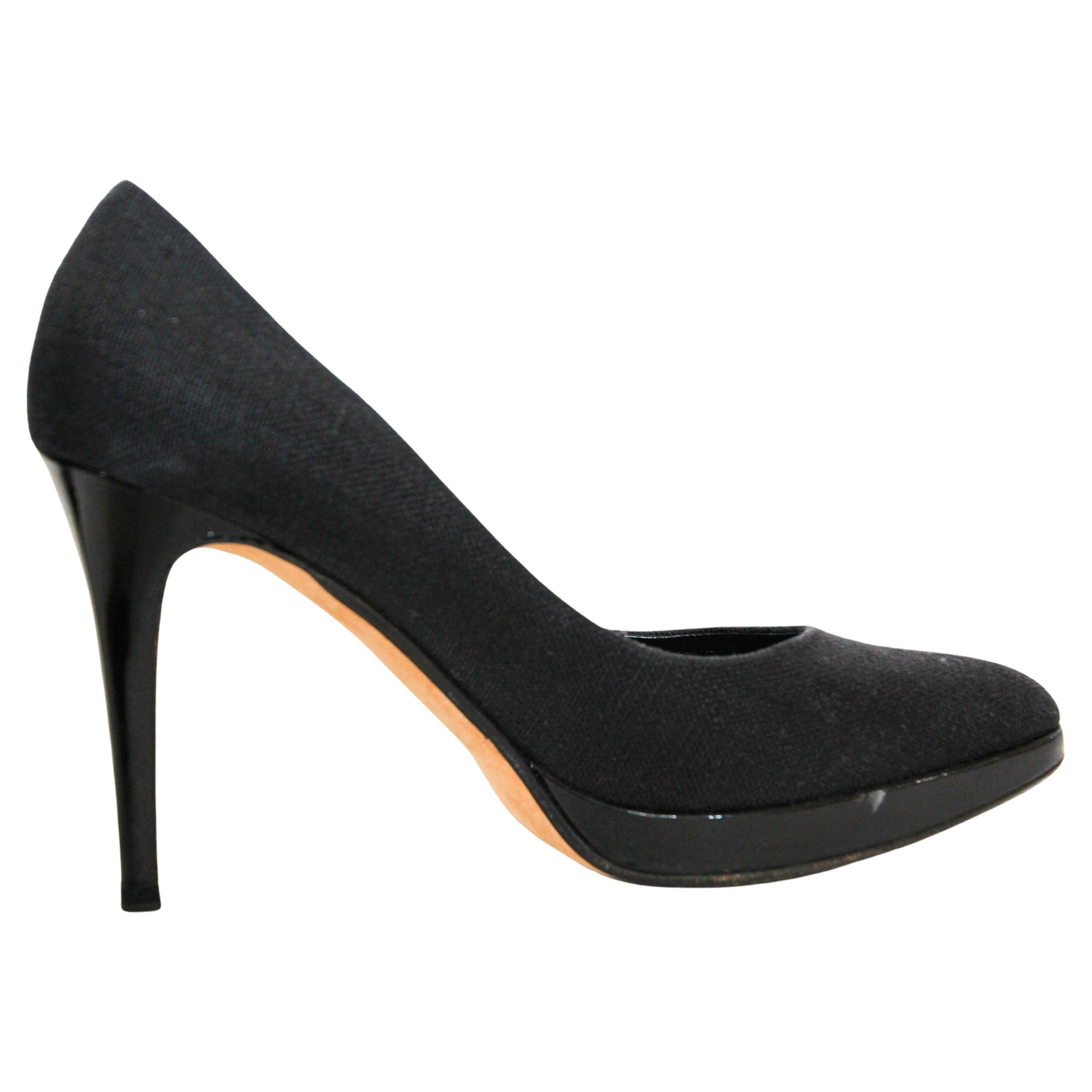 RALPH LAUREN Purple Label Celia wool stiletto pumps.
Look your best with the Ralph Lauren Purple Celia classic chic pumps. 
Crafted from sumptuous Italian black wool, this classic stiletto style features a pointed toe. Every detail of the iconic