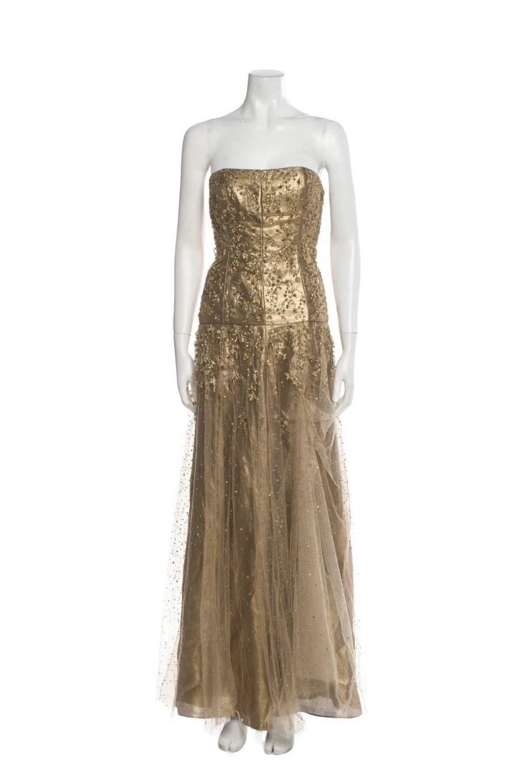 A masterpiece from Ralph Lauren’s Fall 2006 Purple Label Collection, this gold strapless gown is a true showstopper and a rare archival treasure. Originally retailing for $22,000, the dress is fully hand-beaded and embroidered with delicate floral