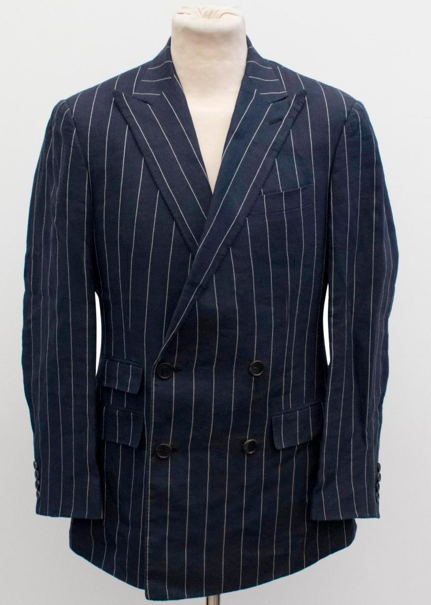 Ralph Lauren men's blue pinstripe suit. 

-Matching double breasted blazer with peak lapel and straight leg trousers. 
-Shell: 100% Linen, Lining: 100% Viscose

Please note, these items are pre-owned and may show signs of being stored even when