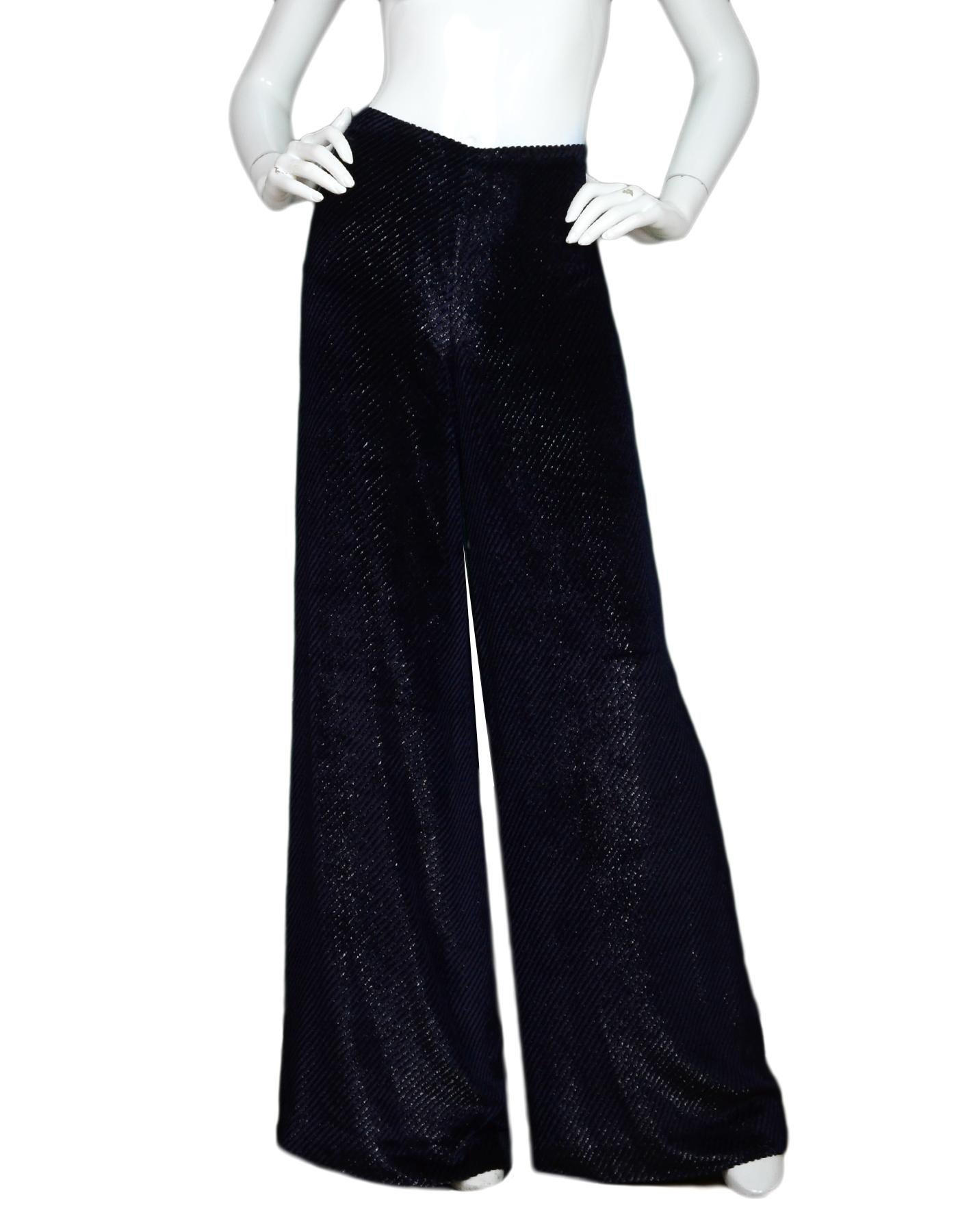 Ralph Lauren Purple Label Navy Wide Leg Velvet Sparkle Pants Sz 2

Made In: USA
Color: Navy/black
Materials: 50% viscose, 35% silk, 15% polyester 
Lining:  100% silk
Closure/Opening: Hidden side zipper with hook eye at top
Overall Condition: