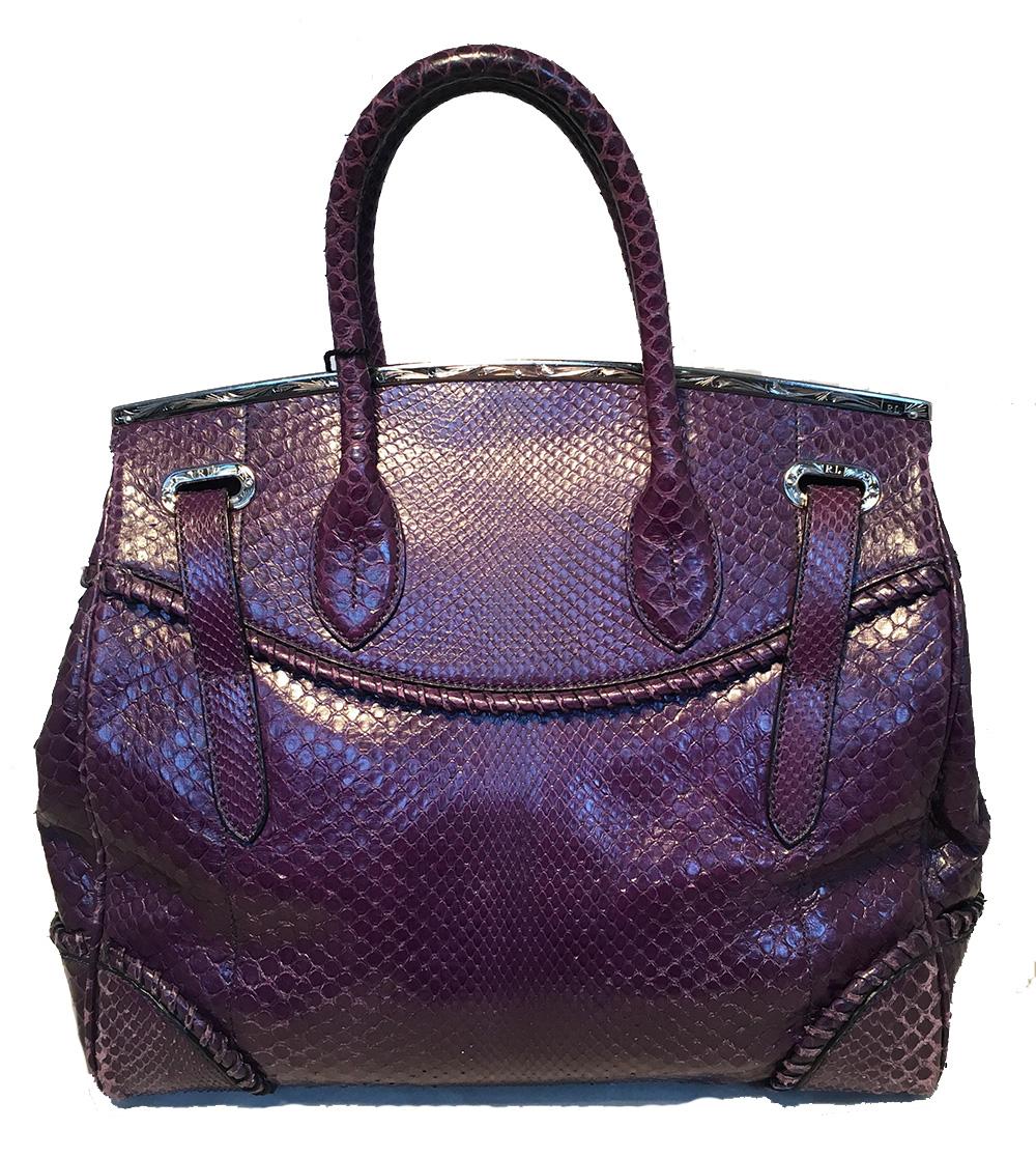Ralph Lauren Purple Label Purple Python Snakeskin Ricky Bag Tote in excellent condition. Purple python snakeskin exterior trimmed with engraved silver hardware. Sliding front latch closure with 2 side buckle straps opens to a black suede lined