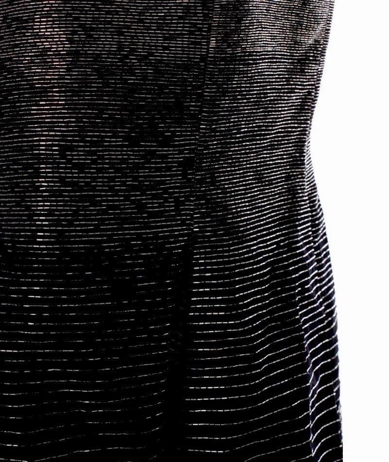 A true showstopper from Ralph Lauren’s Purple Label, this silver hand-beaded bustier gown from the Fall 2005 runway is pure red-carpet fantasy. Worn on the runway by supermodel Anna Jagodzinska and on the red carpet by Sheryl Crow at the 2006 Met