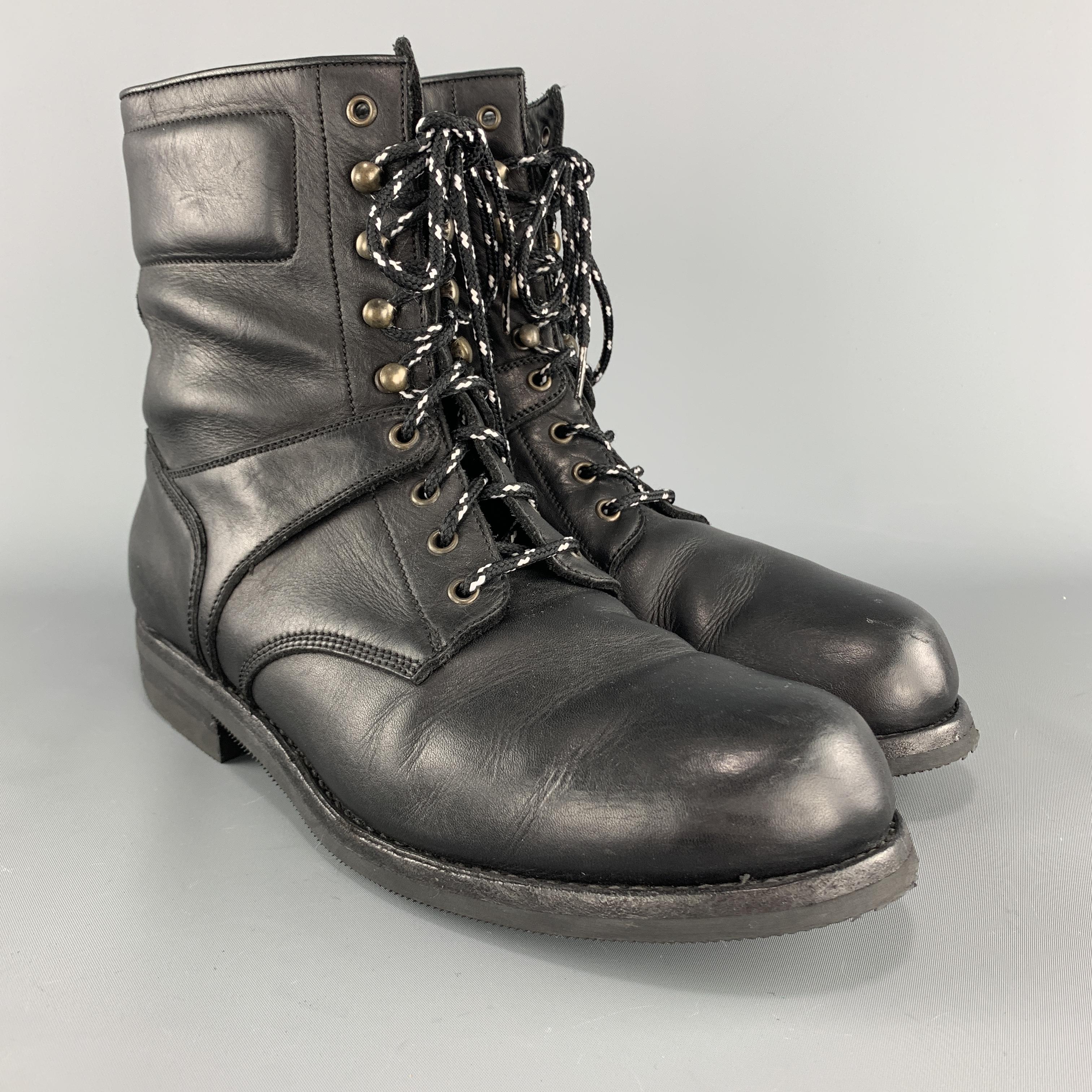 RALPH LAUREN PURPLE LABEL combat boots come in black leather with grommet and hook lace up front, panels, and rubber sole. Made in Italy.

Excellent Pre-Owned Condition.
Marked: UK 11 D

Outsole: 12 x 4.5 in.
Length: 7.5 in.