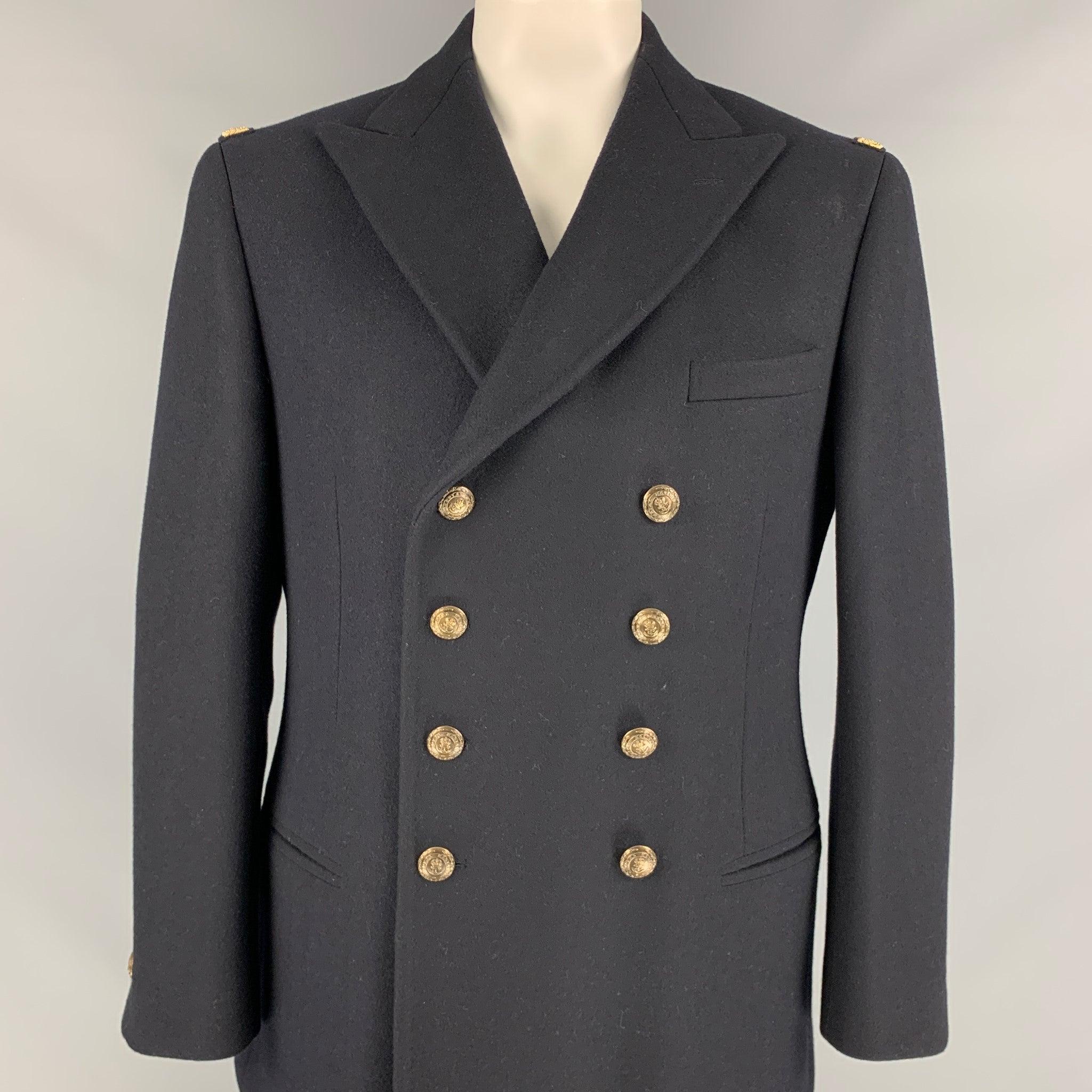 RALPH LAUREN PURPLE LABEL coat comes in a black wool / cashmere with a full liner featuring gold stitching details, peak lapel, slit pockets, and a double breasted closure.
Very Good
Pre-Owned Condition. 

Marked:  42 

Measurements: 
