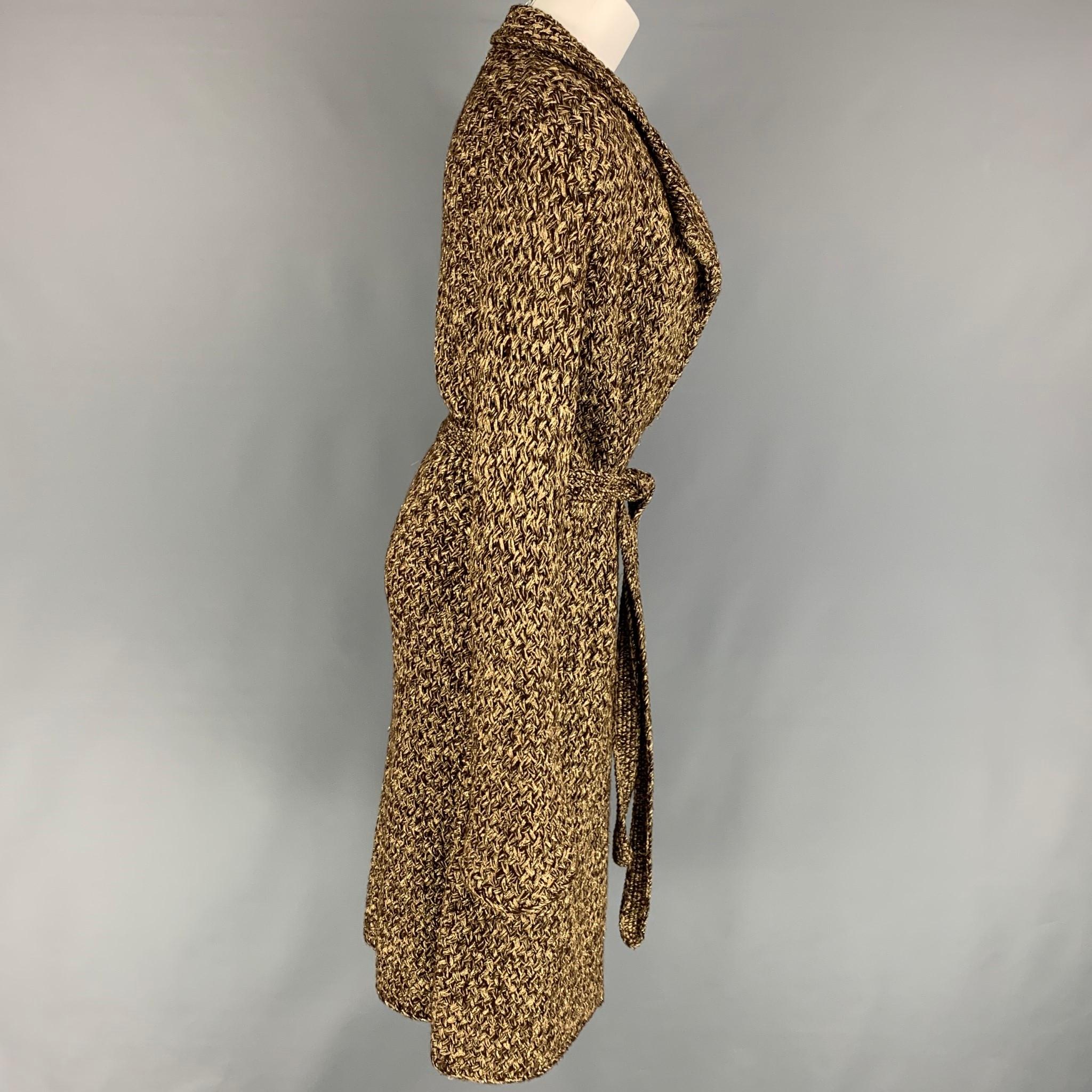 RALPH LAUREN 'Purple Label' coat comes in a brown & gold woven cashmere blend featuring a notch lapel, belted detail, and a open front. 

Very Good Pre-Owned Condition.
Marked: M
Original Retail Price: $3,990.00

Measurements:

Shoulder: 14