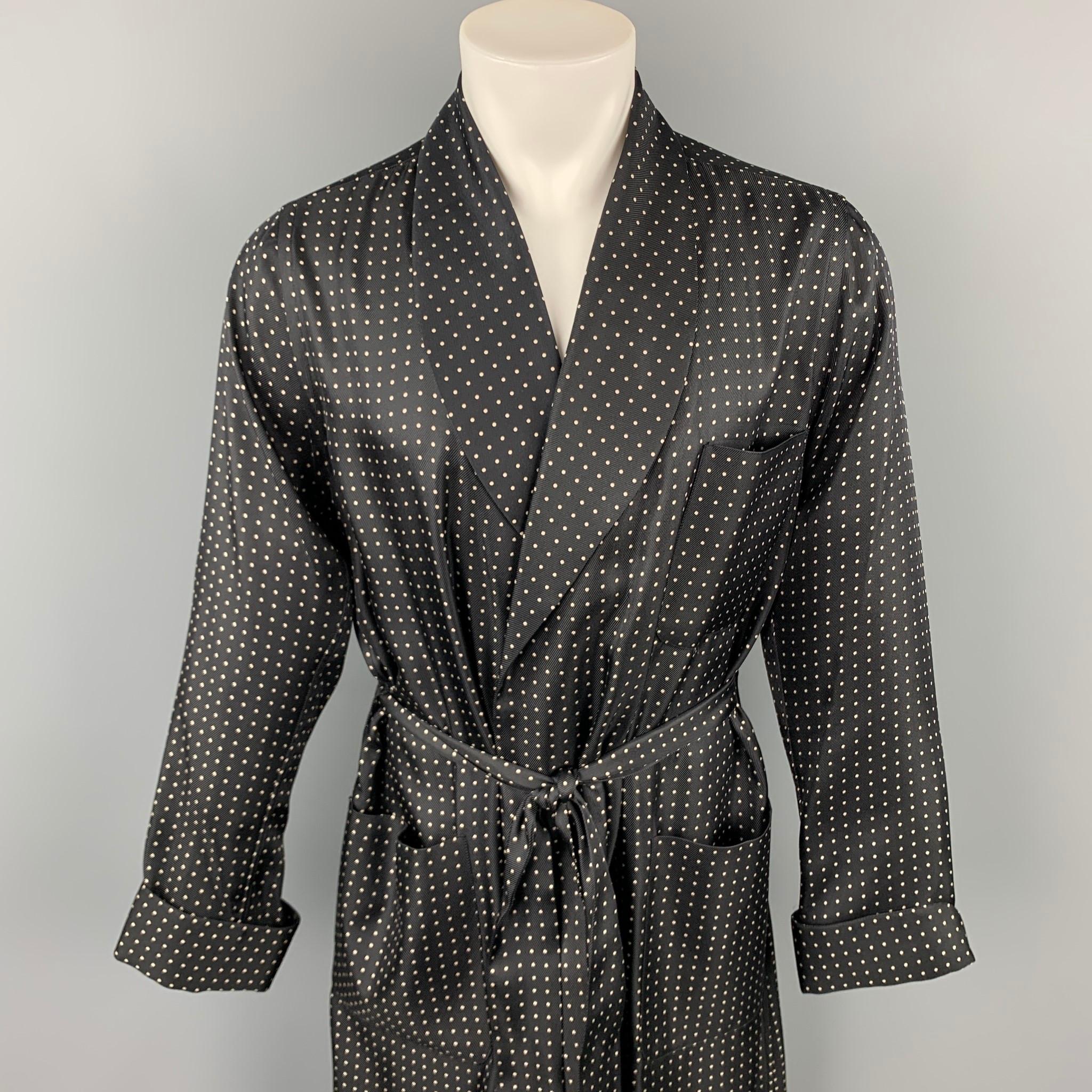 RALPH LAUREN Purple Label robe comes in a black & white polka dot silk featuring a shawl lapel, open front, patch pockets, and a belted closure. Made in Italy.

New With Tags. 
Marked: S
Original Retail Price: $1,750.00

Measurements:

Shoulder: 18