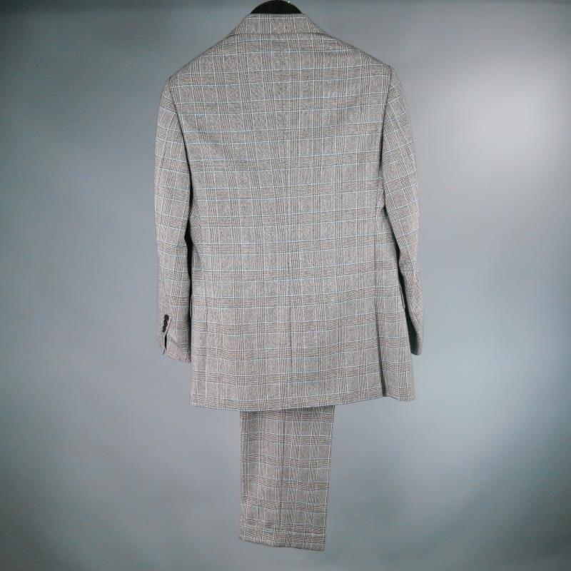 PURPLE LABEL by RALPH LAUREN.  Notch Lapel, 2 Button Wool Cashmere suit, Three Flap Pocket.  Fully lined.  Classic pant with cuff.  Made in Italy.

Excellent Pre- Owned Condition.
Tag Size: 40

Measurements:

Chest: 38 in.
Shoulder: 17 in.
Sleeve: