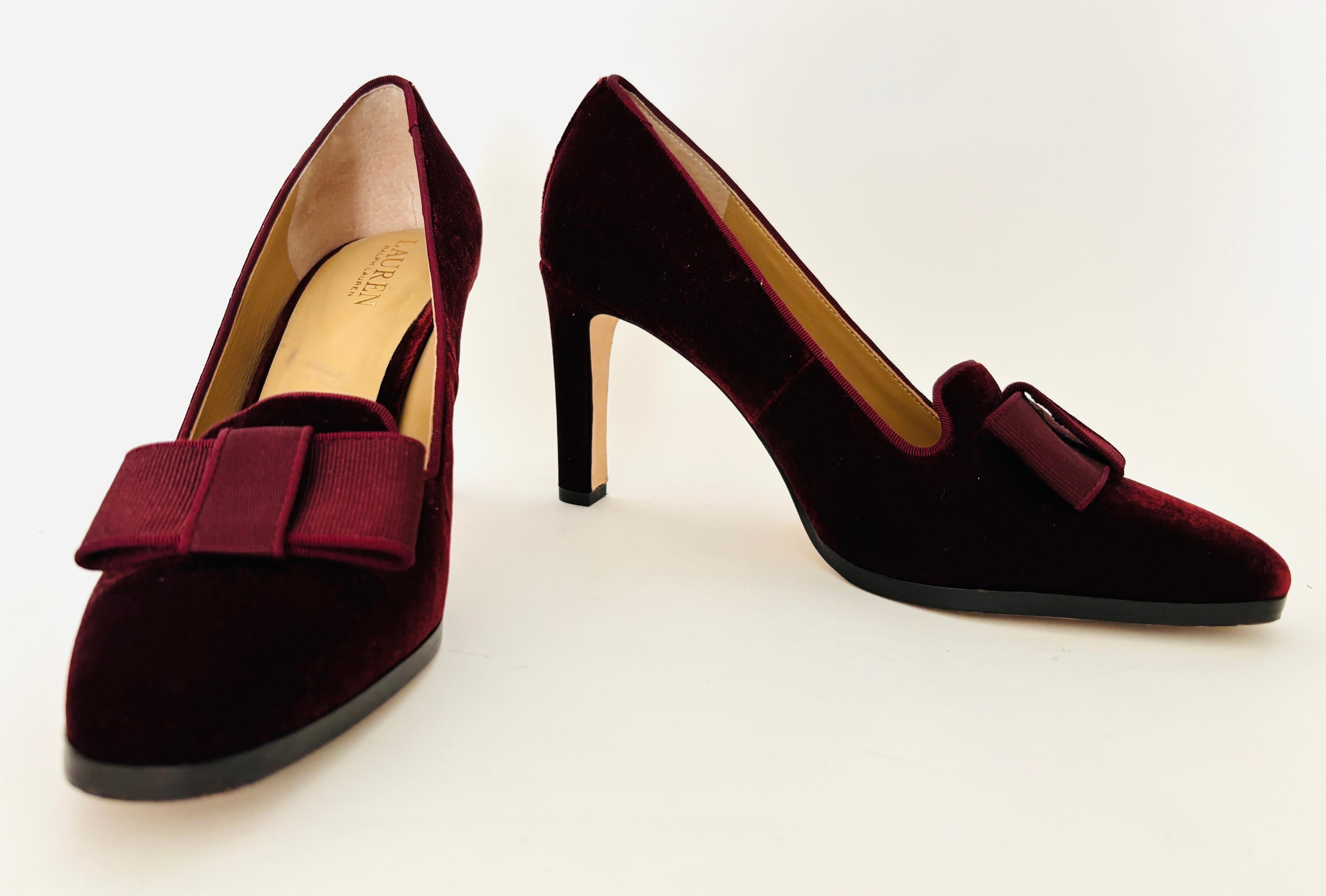 Ralph Lauren Purple Velvet Stiletto Pumps with Bow, Corah Style.

Elegant and timeless, these Ralph Lauren Corah pumps embody vintage-inspired sophistication with a modern edge. Crafted from sumptuous deep rhodonite purple velvet, the design