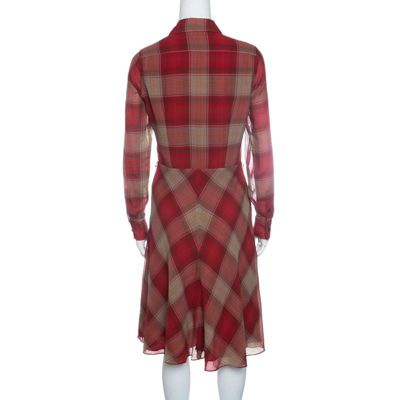 Bridging the gap between formal and casual, this shirt dress from Ralph Lauren is a polished friend to Monday presentation along with a calm option for weekends. Featuring a red plaid pattern and fit and flare silhouette, this one is crafted in