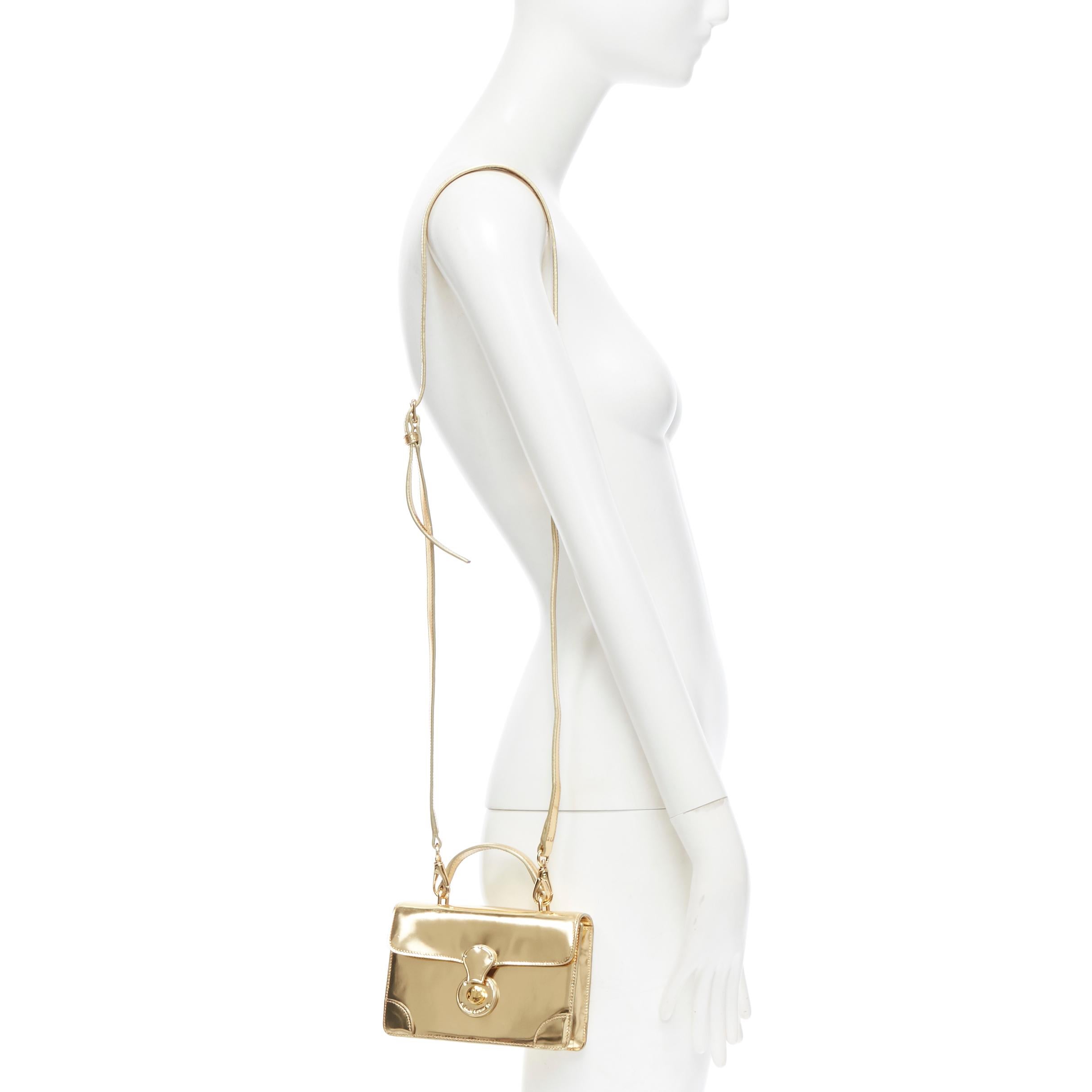 RALPH LAUREN Ricky mirrored gold lock flap leather crossbody small satchel bag Reference: LNKO/A01228 
Brand: Ralph Lauren 
Model: Ricky 
Material: Leather 
Color: Gold 
Pattern: Solid 
Closure: Clasp 
Extra Detail: Removable shoulder strap. Lock