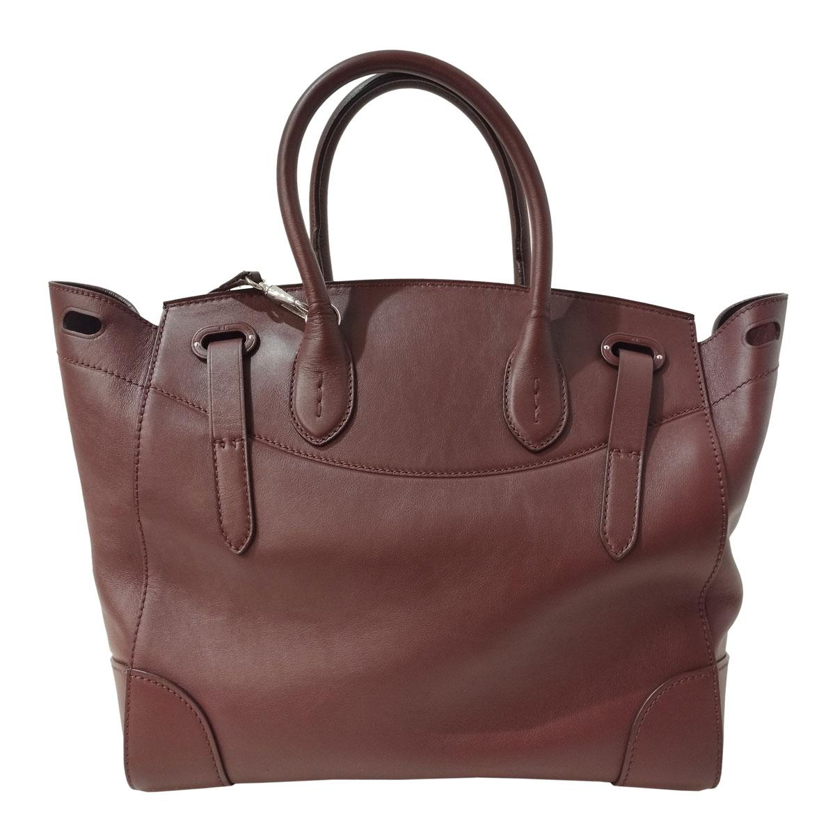 Ricky 33 Tote bag
Leather
Bordeaux color
Two handles
Can be worn crossbody too
Internal leather, cognac color
Internal pocket 
Cm 40 x 28 x 17 (15,7 x 11 x 6,69 inches)
Express shipping included in the price