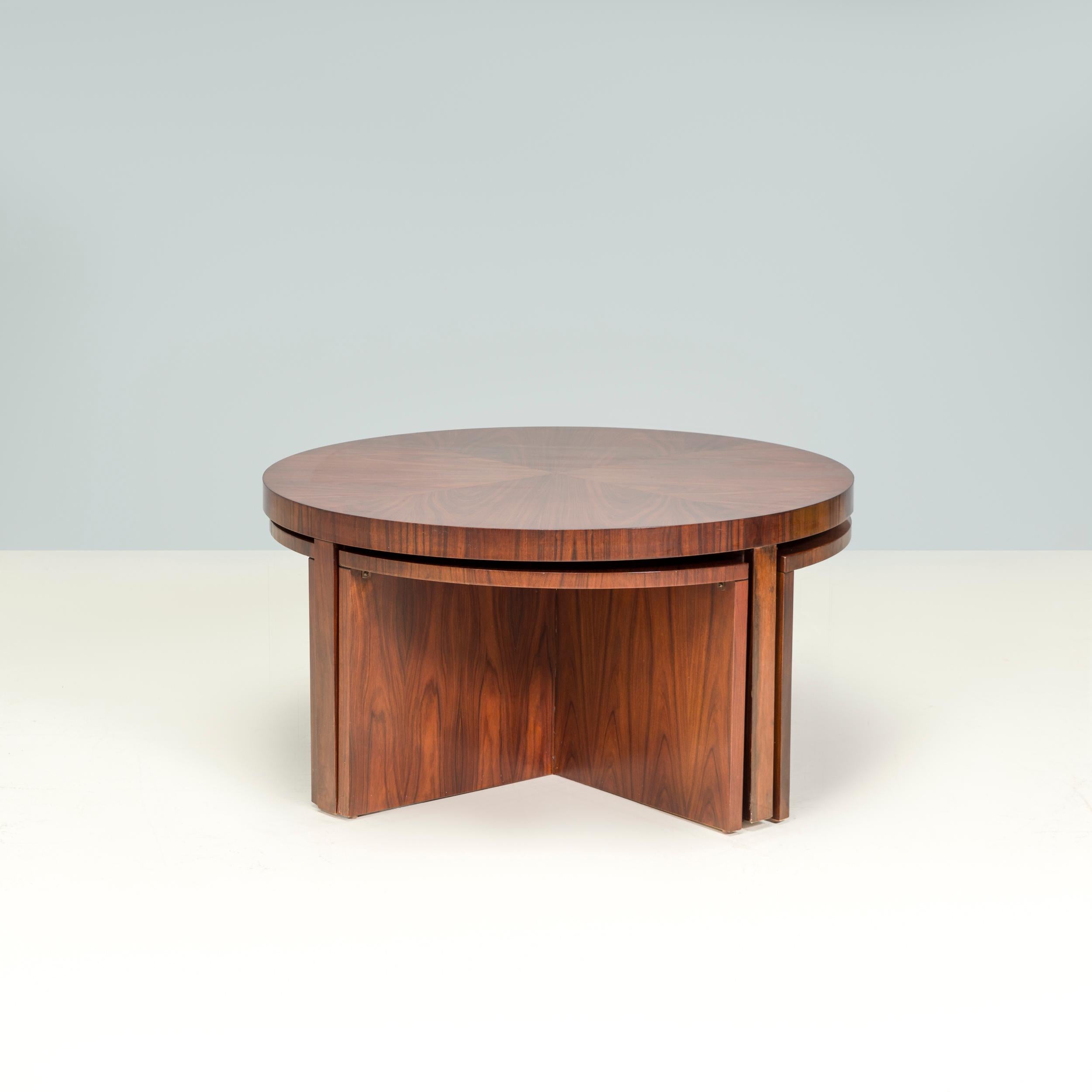 Inspired by the 1930s, the Ralph Lauren Duke collection balances elegant design with luxury handcrafted materials.

Constructed from wood with a Santos rosewood veneer finish, the Duke coffee table is formed of one larger round table with four