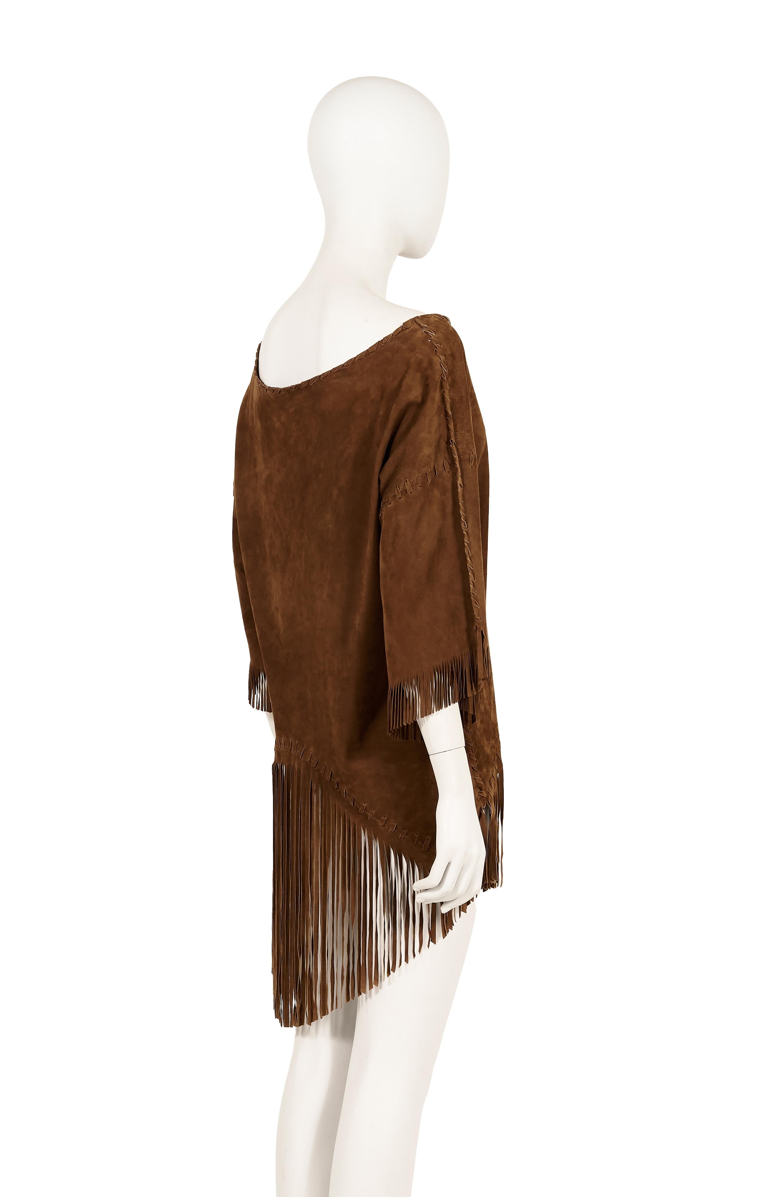 - Ralph Lauren Purple Label Spring Summer 2011 collection
- Sold by Gold Palms Vintage 
- Brown suede fringe top with visible stitching
- Boat neckline
- 3/4 sleeves 
- Asymmetrical bottom cut pattern
- Small tear on the right bottom fringes