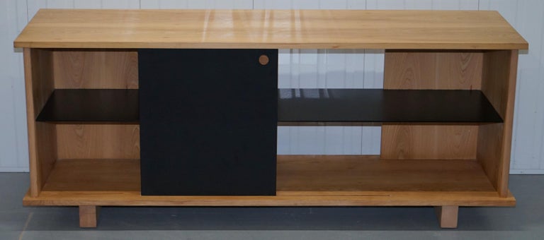 We are delighted to offer for sale this new ex-showroom stock Ralph Lauren light luxury hardwood timber sideboard buffer with solid polished slate stone door and shelves

I have recently taken into stock around 12 brand new showroom pieces from
