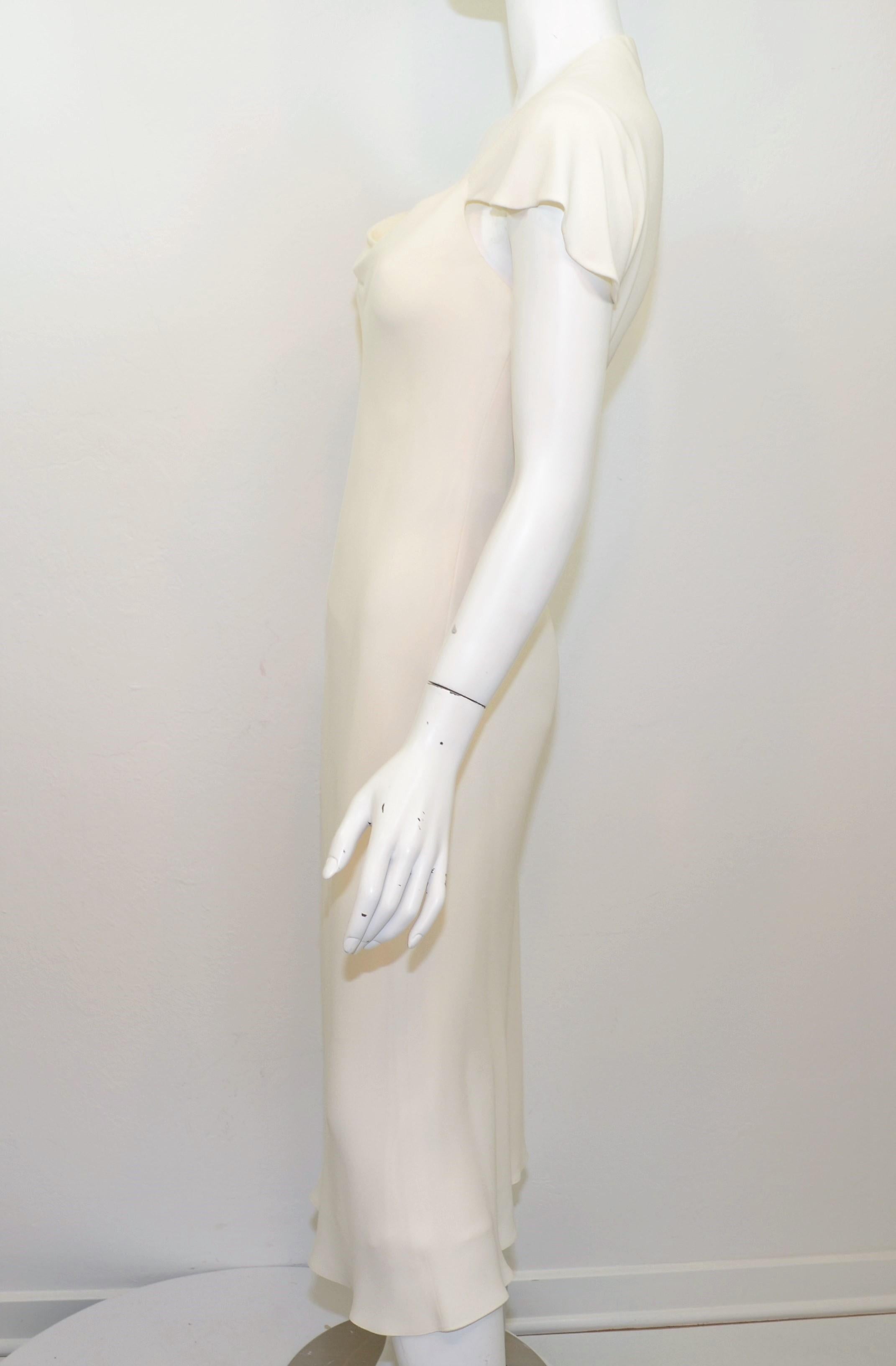 Ralph Lauren Silk Bias Cut Gown / Minimalist Dress. Featured in an ivory cream color, composed with 100% silk, size 4, bias cut fabric which helps accentuate body lines and curves and allows soft draping. Dress has a draped neckline and cap sleeves,
