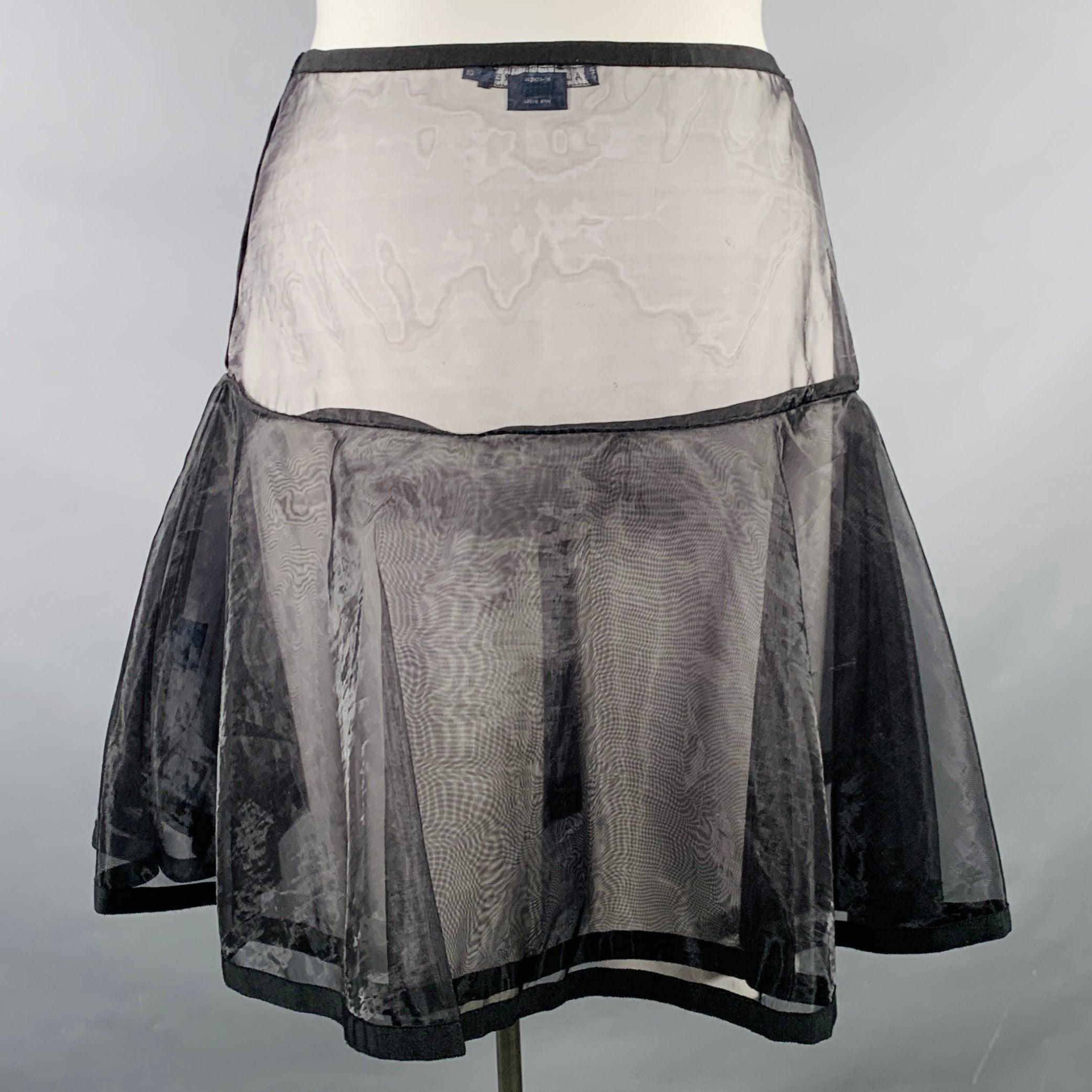 RALPH LAUREN BLUE LABEL skirt
in a black nylon featuring a see through style, A-line shape, and side snap closure. Excellent Pre-Owned Condition. 

Marked:   US 10 

Measurements: 
  Waist: 32 inches Hip: 40 inches Length: 19.5 inches 
  
  
 
Sui