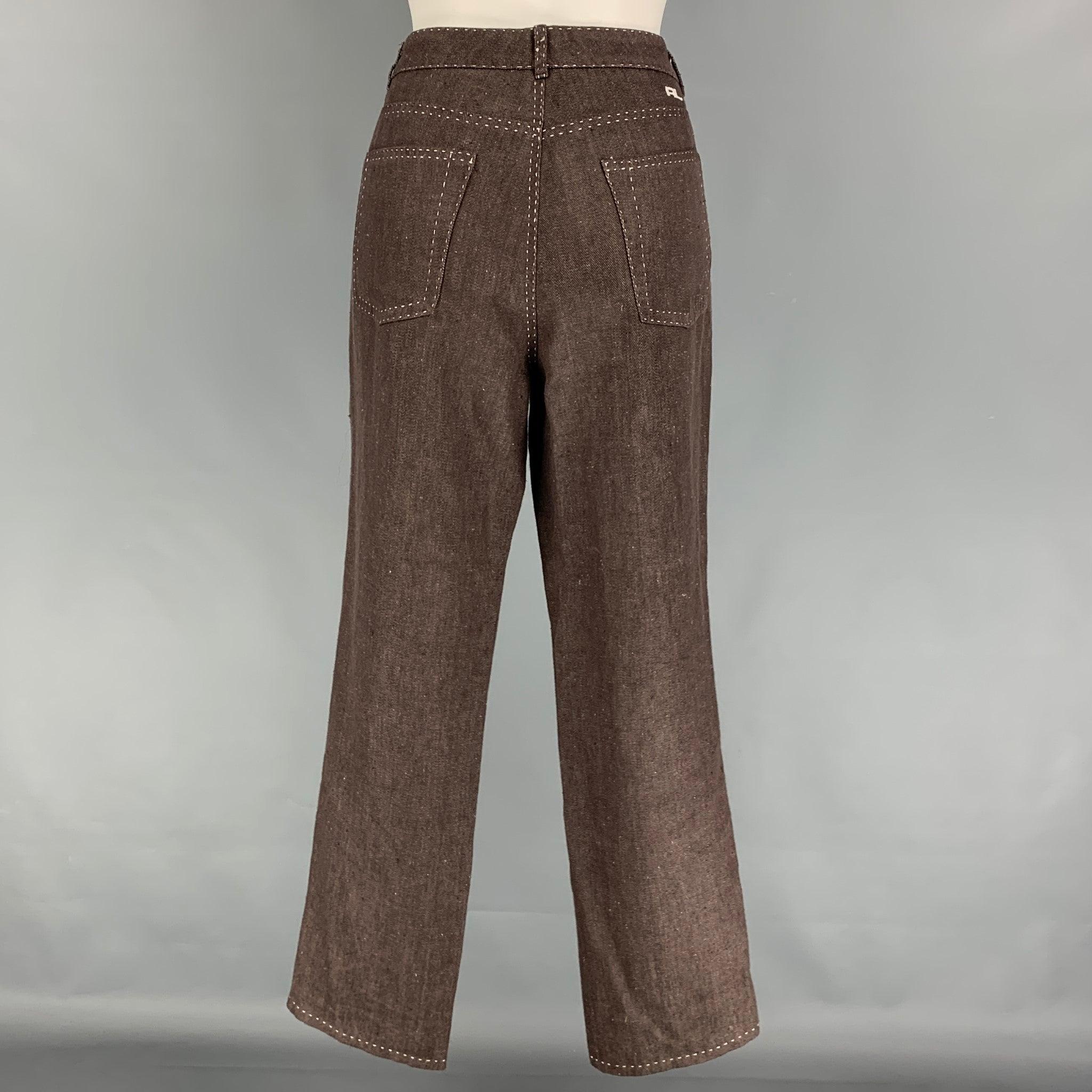 RALPH LAUREN Collection casual pants comes in a brown linen featuring a relaxed fit, contrast stitching, and a zip fly closure. Made in USA.
Good
Pre-Owned Condition. Light wear at front.  

Marked:   10 

Measurements: 
  Waist: 32 inches  Rise: 10