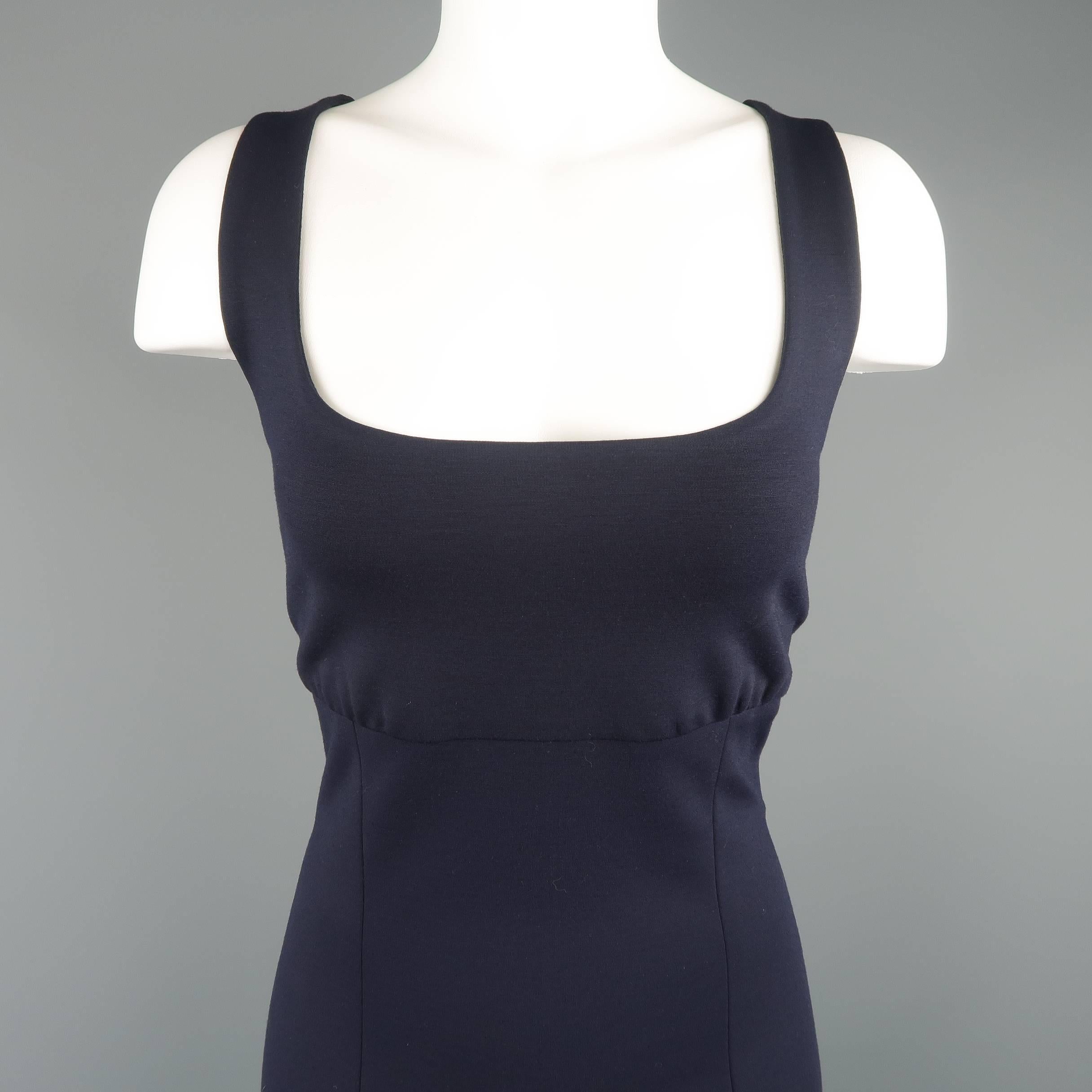 RALPH LAUREN BLACK LABEL sheath dress comes in navy blue wool blend jersey knit wit a scoop neck, thick straps gathered underbust seam and slim fit skirt. Mad ein USA.
 
Excellent Pre-Owned Condition.
Marked: 10
 
Measurements:
 
Shoulder: 15