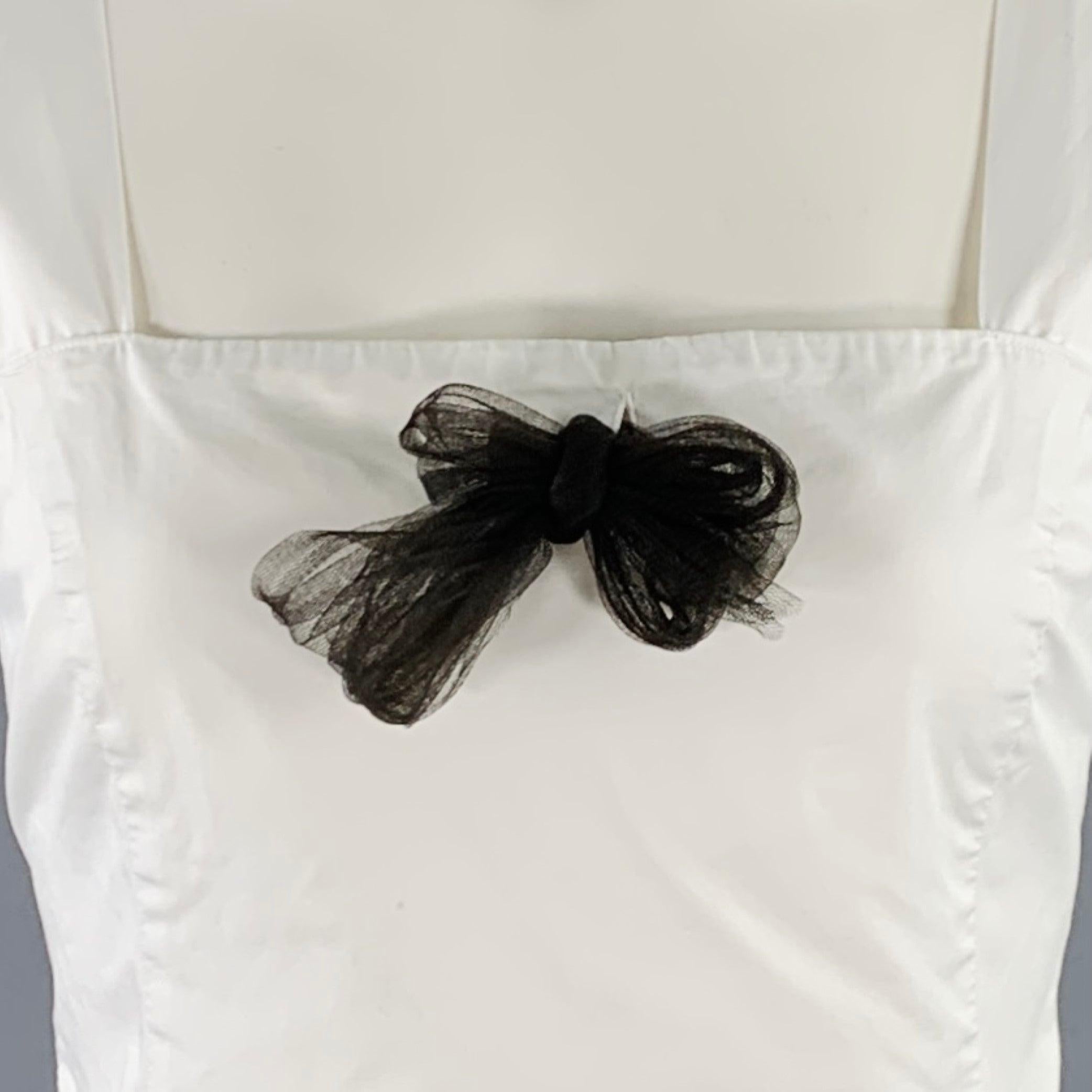 RALPH LAUREN BLACK LABEL casual top
in a white cotton woven fabri featuring a sleeveless style, black tulle mesh bow detail, and hidden side zipper closure.Very Good Pre-Owned Condition. Minor marks. 

Marked:   US 10 

Measurements: 
 
Shoulder: 14