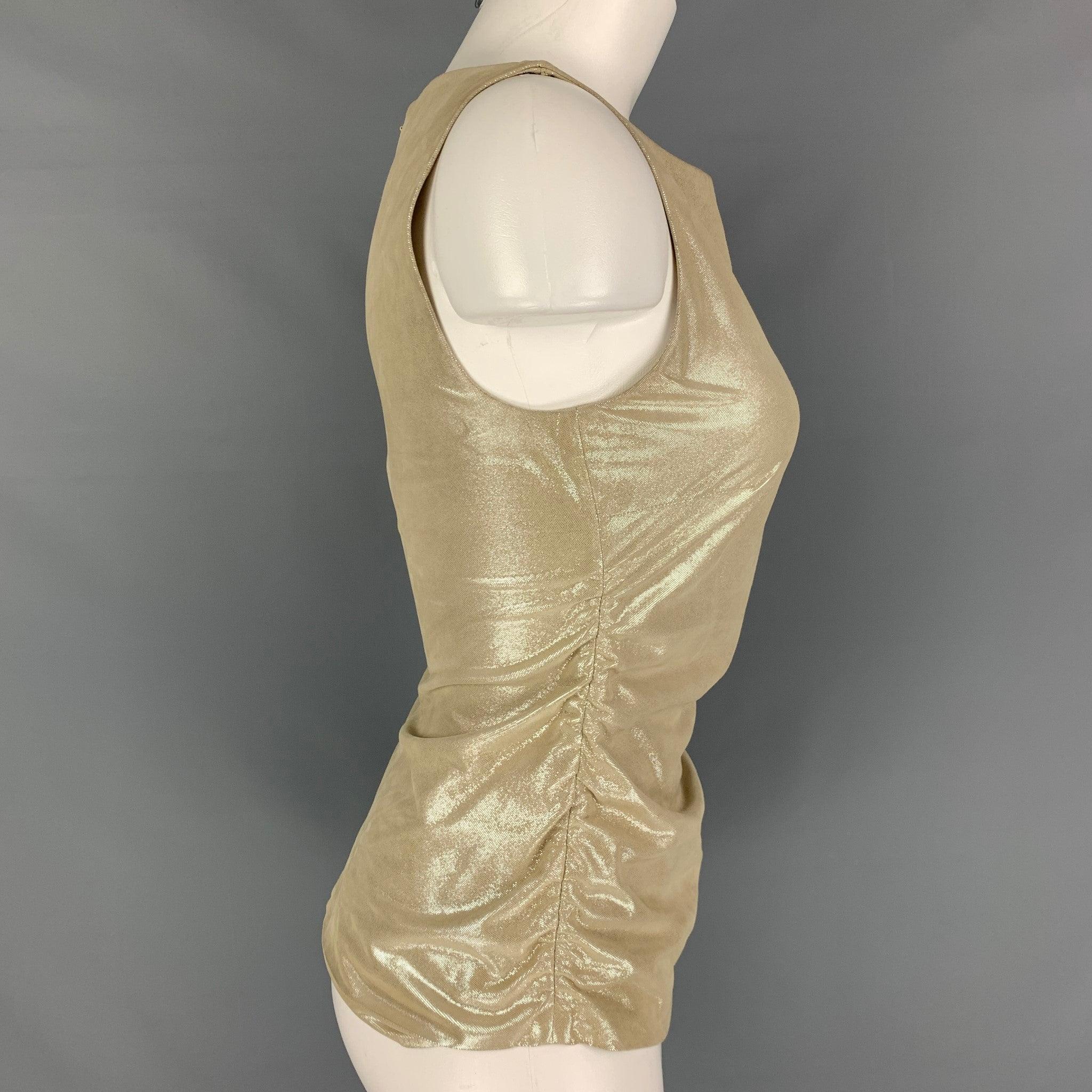 RALPH LAUREN BLACK LABEL by sleeveless pullover comes in a beige suede featuring a sleeveless style, silver metallic finishing, and a full length invisible zipper. Made in Italy. Very Good Pre-Owned Condition. Minor signs of wear. 

Marked:   2