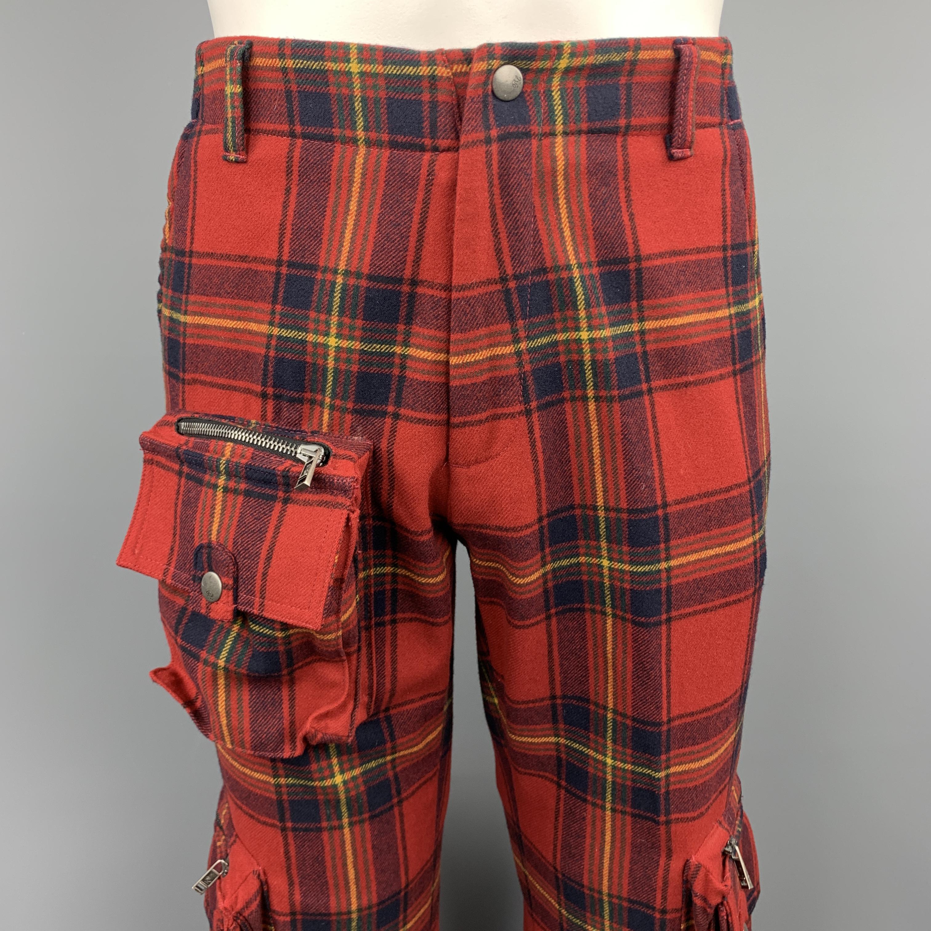 RALPH LAUREN PURPLE LABEL pants come in red plaid wool with patch flap cargo pockets throughout. Made in Italy.

Excellent Pre-Owned Condition.
Marked: 30

Measurements:

Waist: 33 in.
Rise: 11.5 in.
Inseam: 31 in.