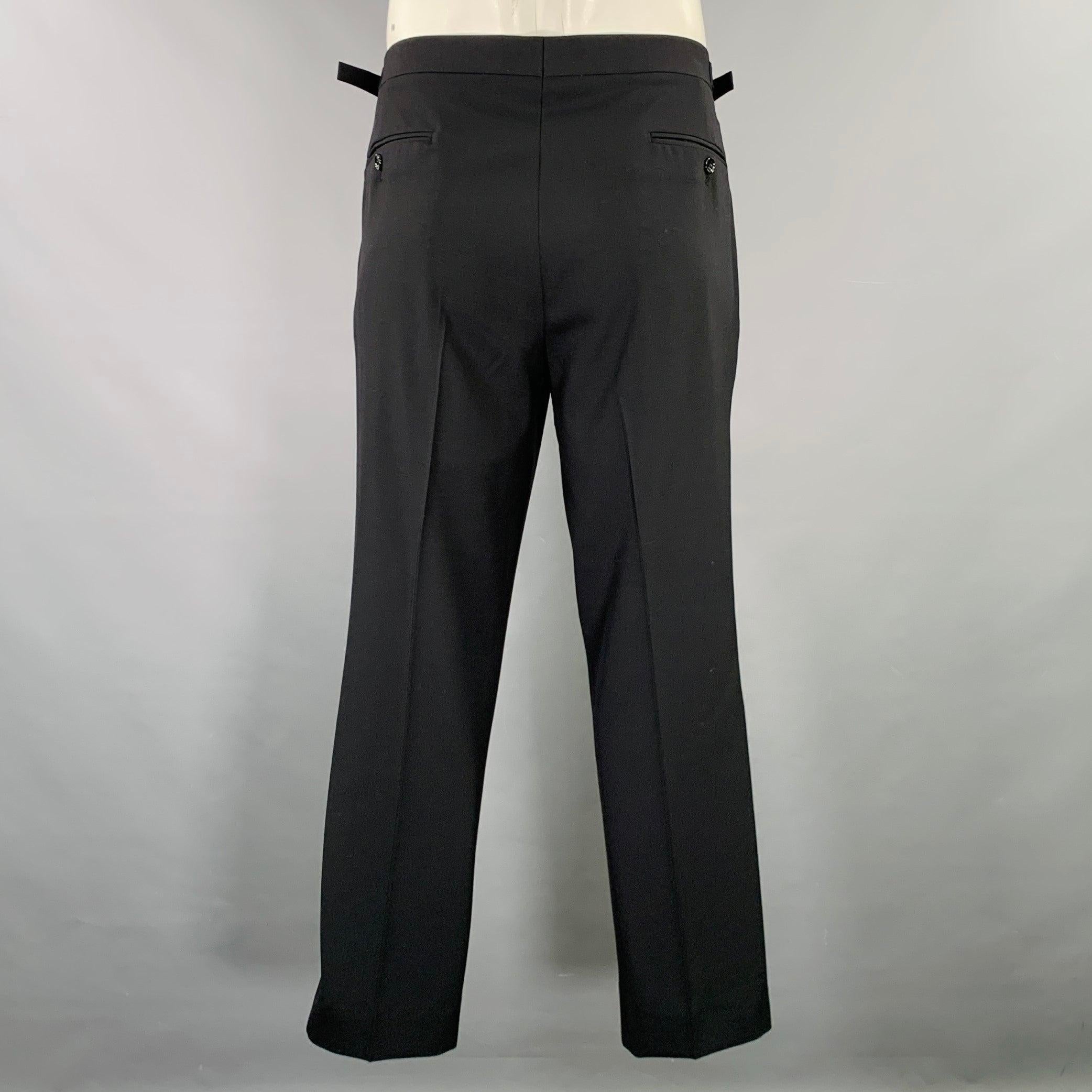 RALPH LAUREN BLACK LABEL tuxedo dress pants
in a black wool fabric featuring a flat front style, adjustable side tabs, and zip fly closure. Made in Italy.Excellent Pre-Owned Condition. 

Marked:   37 

Measurements: 
  Waist: 37 inches Rise: 9