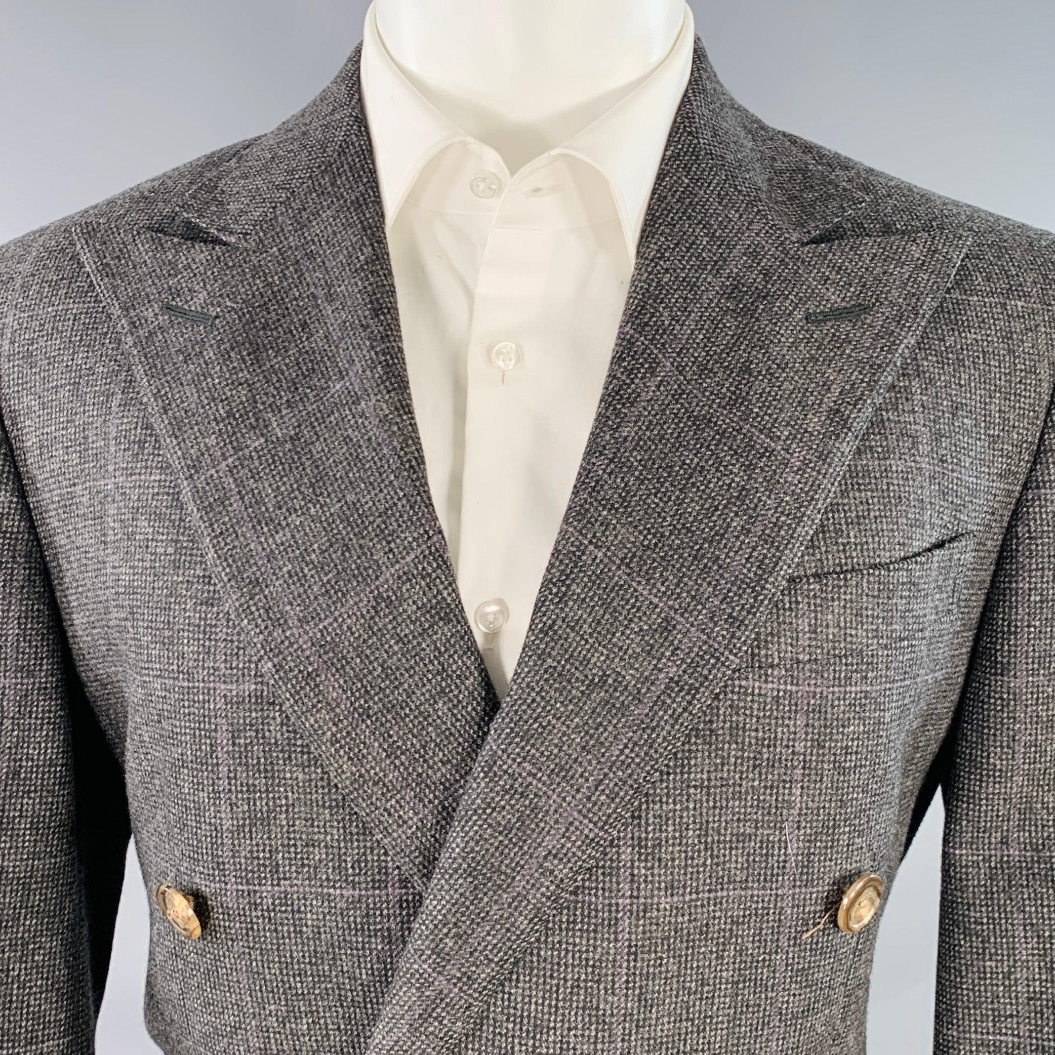 POLO by RALPH LAUREN sport coat in a black nailhead-patterned wool featuring a double breasted style, peak lapel, double vented back, and double button closure. Note: the sleeves on this garment have been professionally altered and are slightly