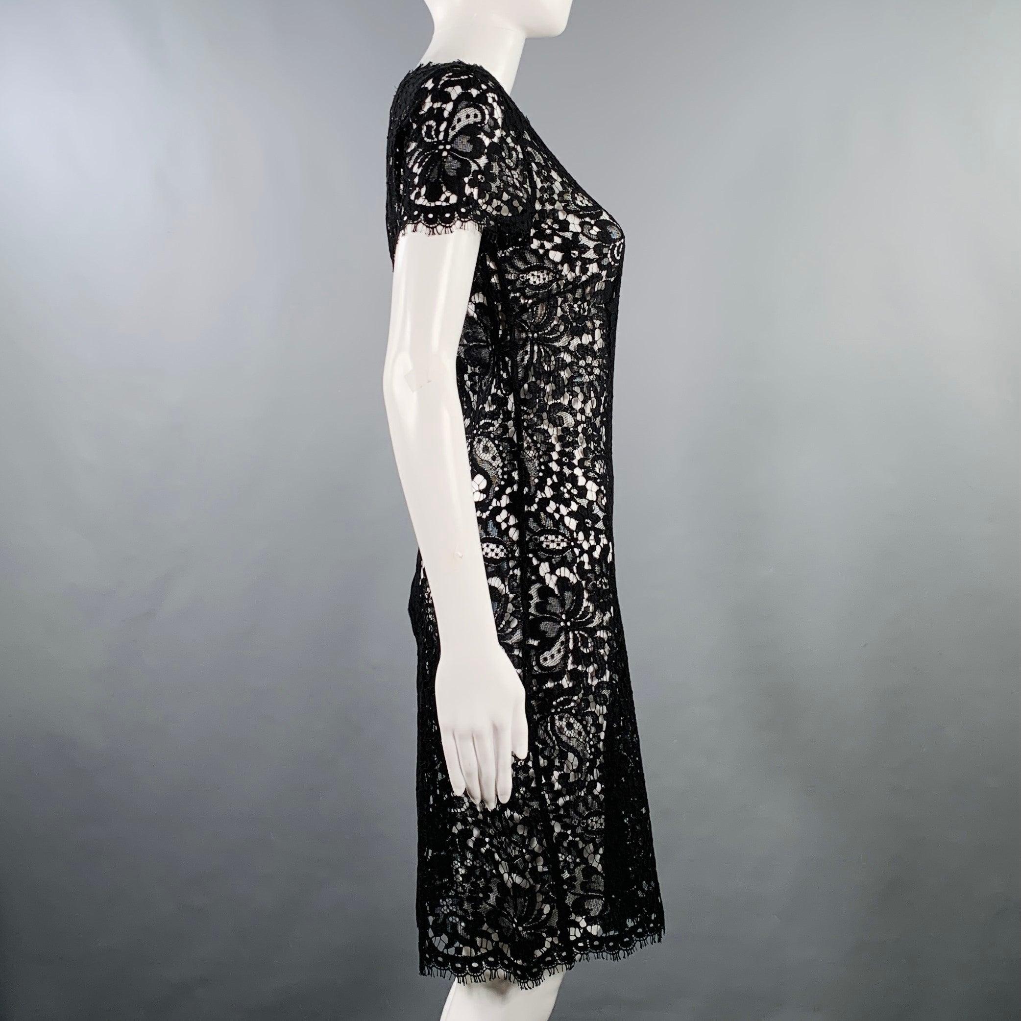 RALPH LAUREN BLACK LABEL dress in a black lace cotton blend featuring short sleeves and a back zip up closure. Excellent Pre-Owned Condition. 

Marked:   4 

Measurements: 
 
Shoulder: 13 inches Bust: 32 inches Waist: 29 inches Hip: 35 inches