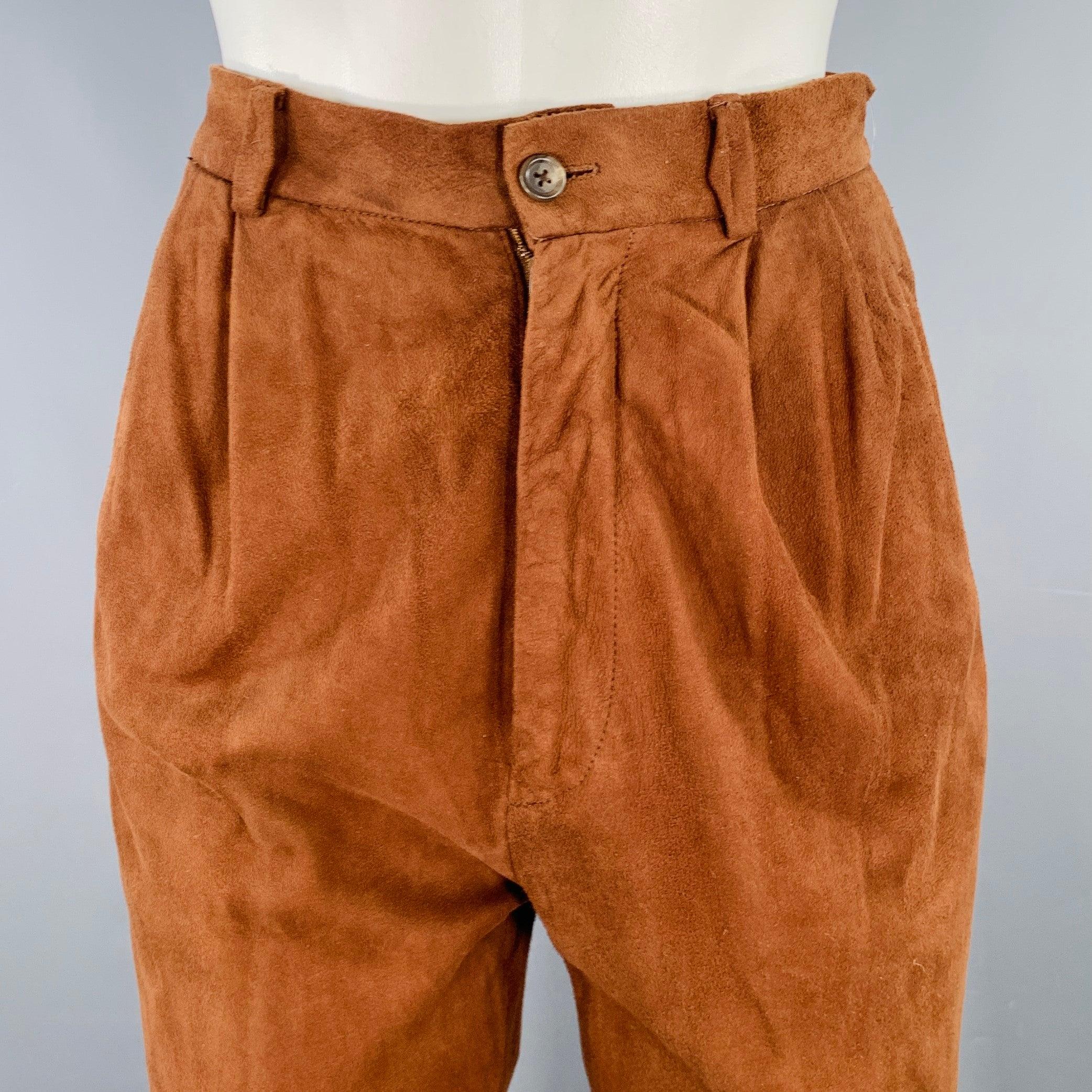 RALPH LAUREN casual pants
in a brown suede featuring a pleated style, cuffed design, and zip fly closure.Excellent Pre-Owned Condition. 

Marked:   4 

Measurements: 
  Waist: 26 inches Rise: 11 inches Inseam: 27 inches 
  
  
 
Sui Generis